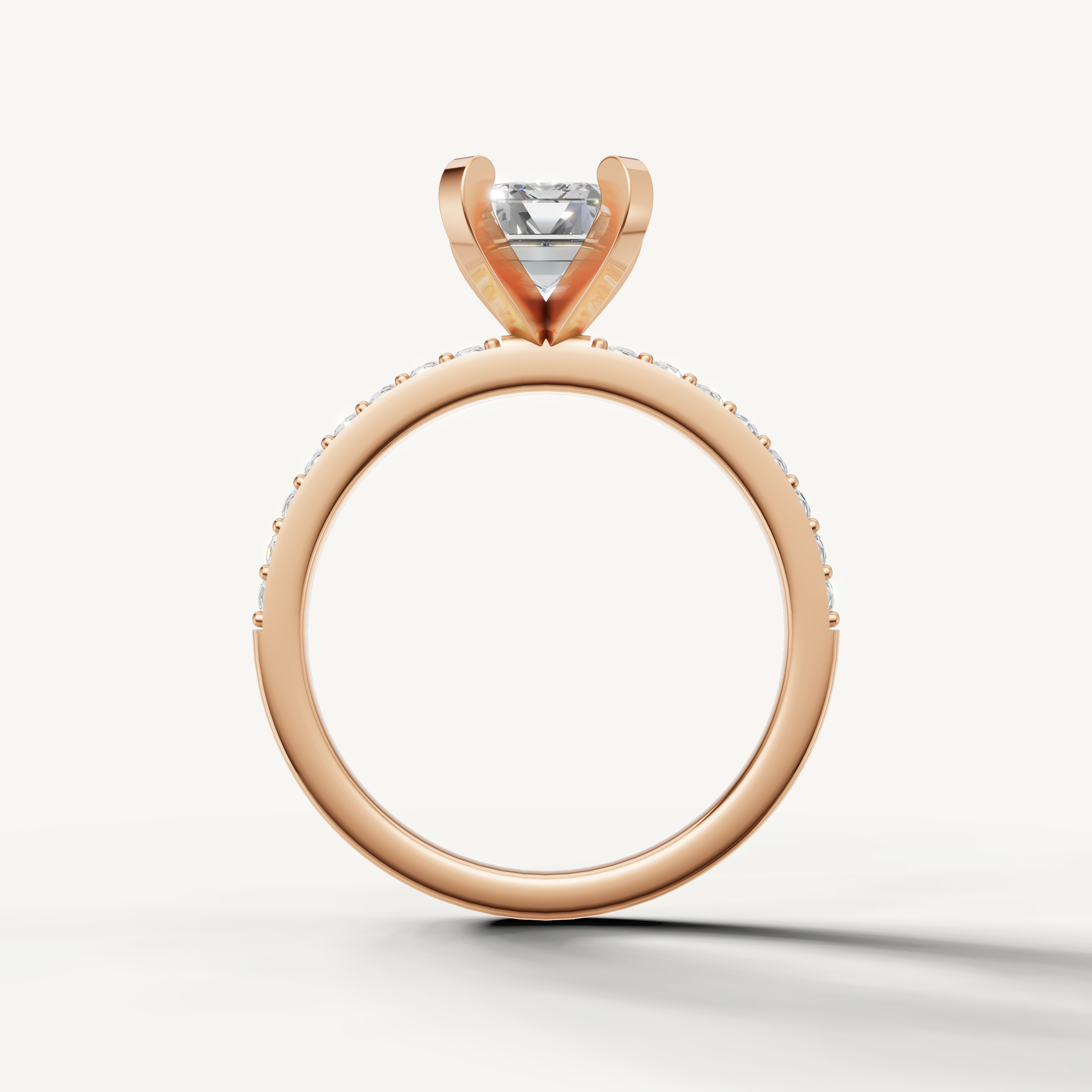 Emerald cut lab grown diamond ring in rose gold thin pavé band modern design