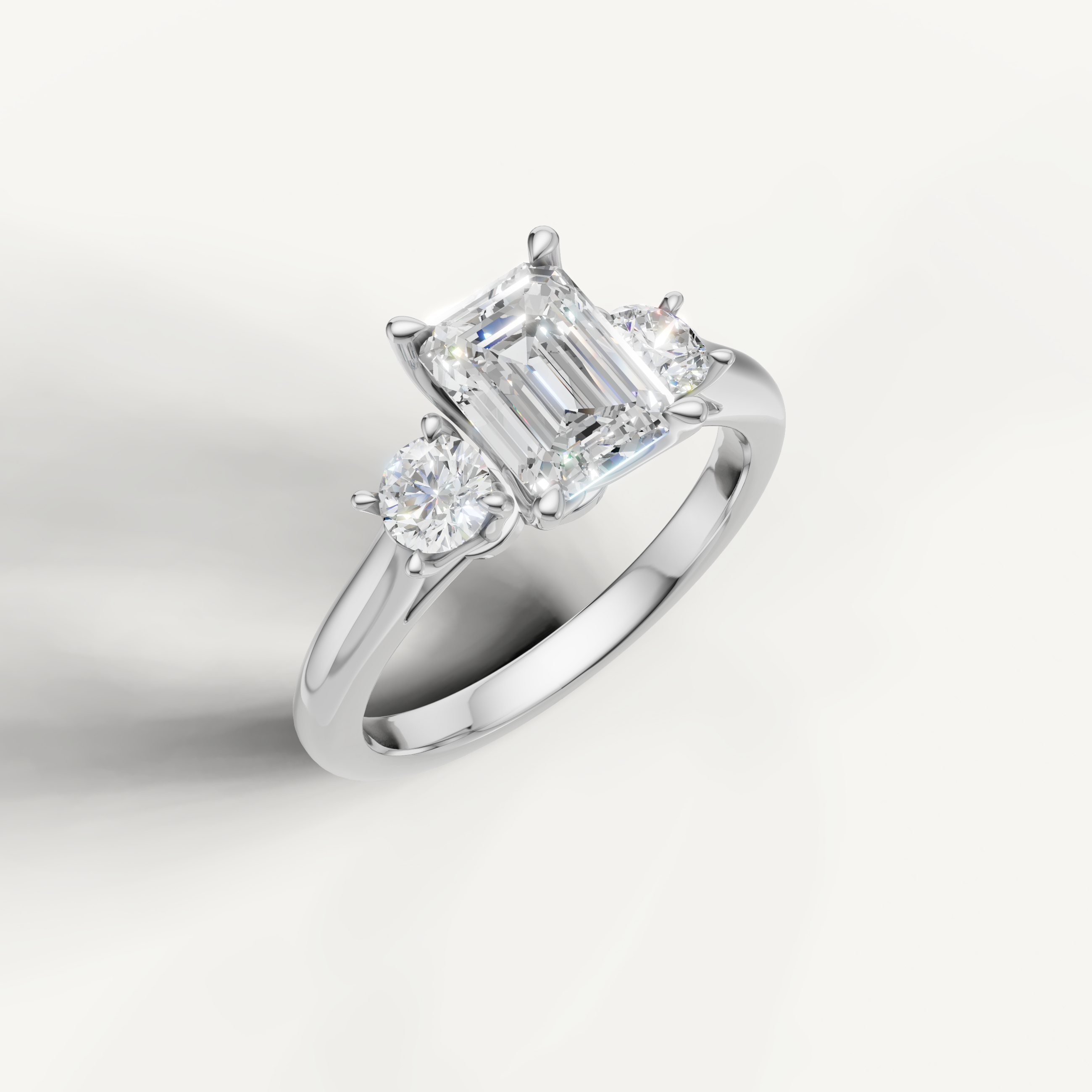 IGI certified emerald cut lab diamond ring with round side stones white gold DEF VVS