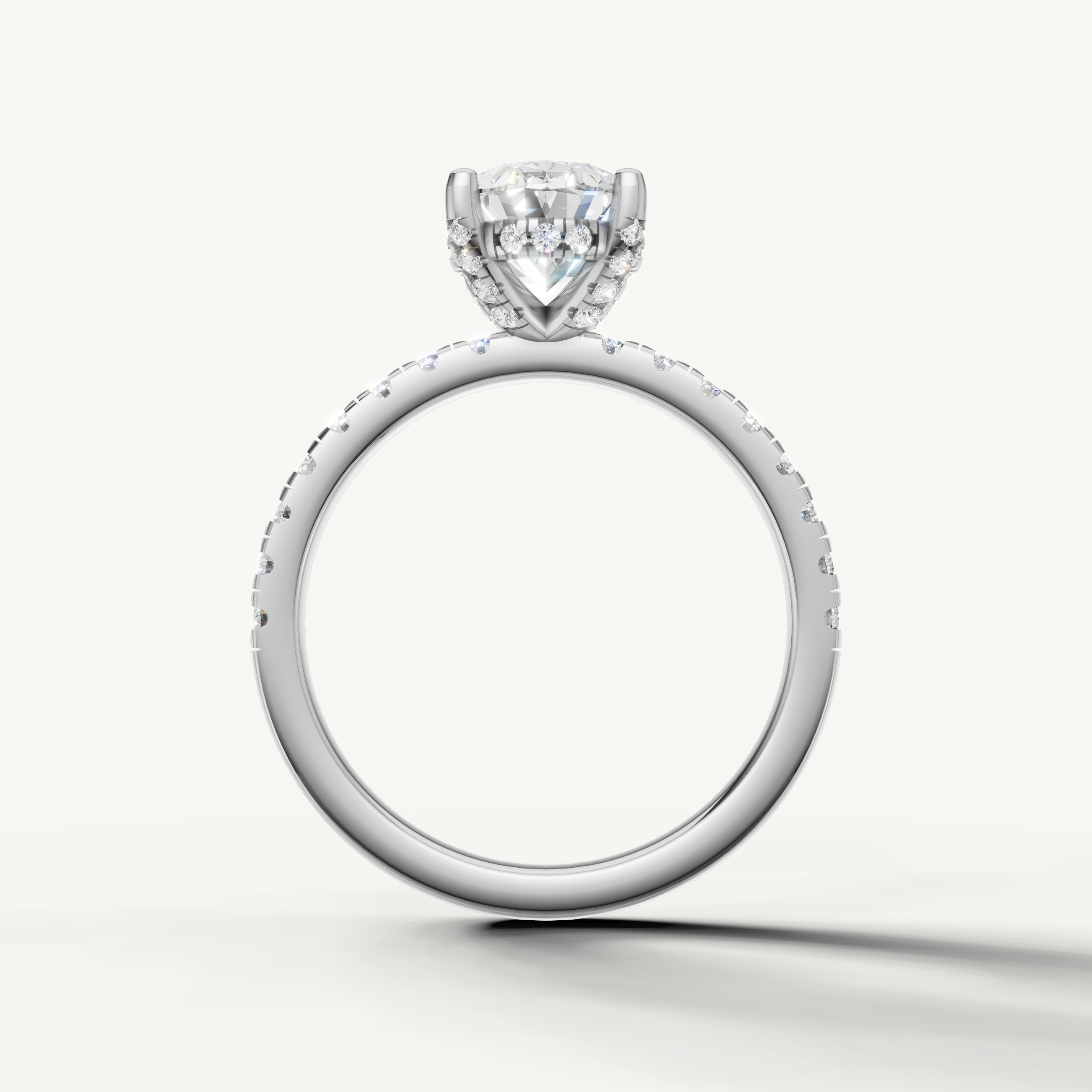 elongated oval lab grown diamond ring with pavé band white gold