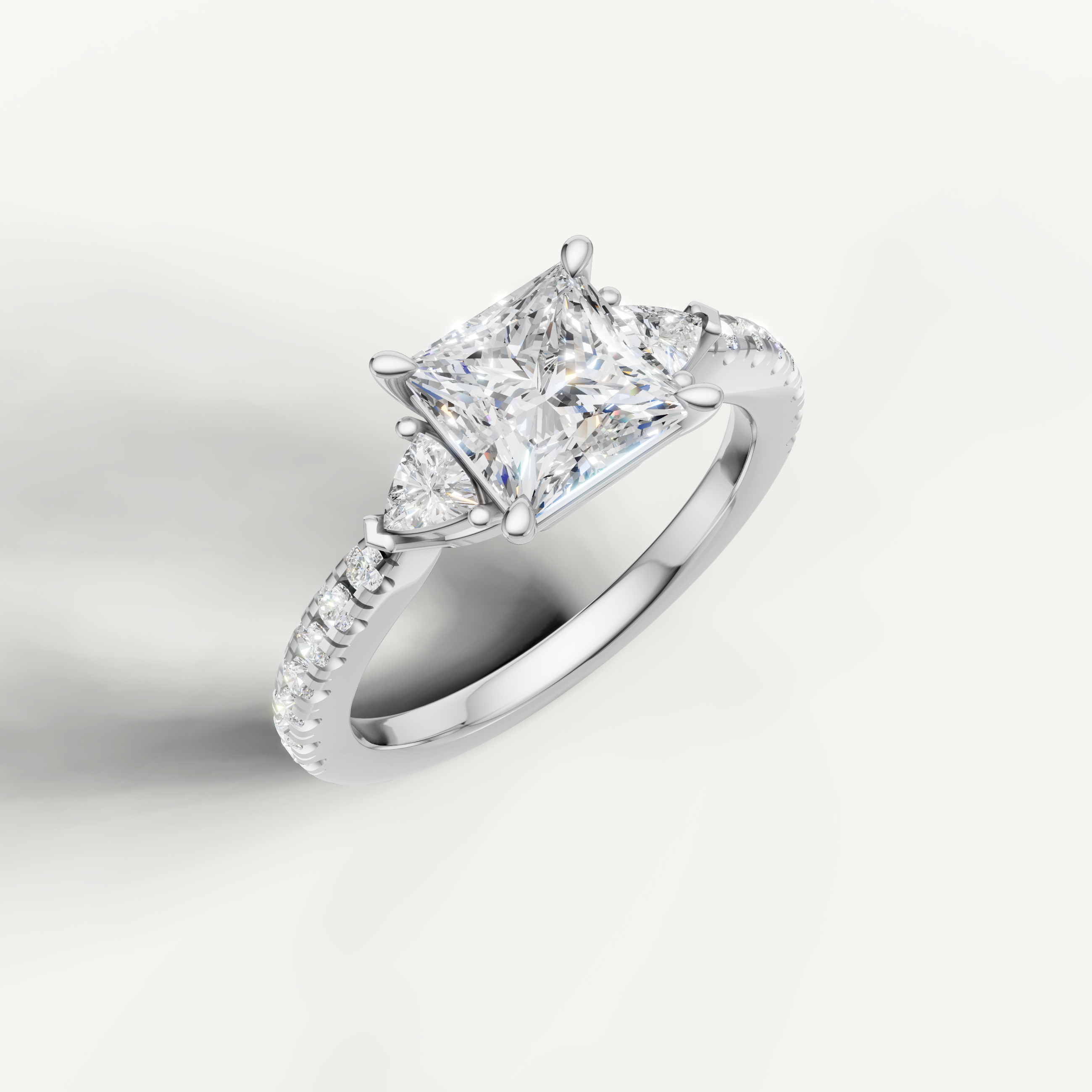 14K white gold princess cut lab grown diamond ring with tapered side diamonds and pavé setting