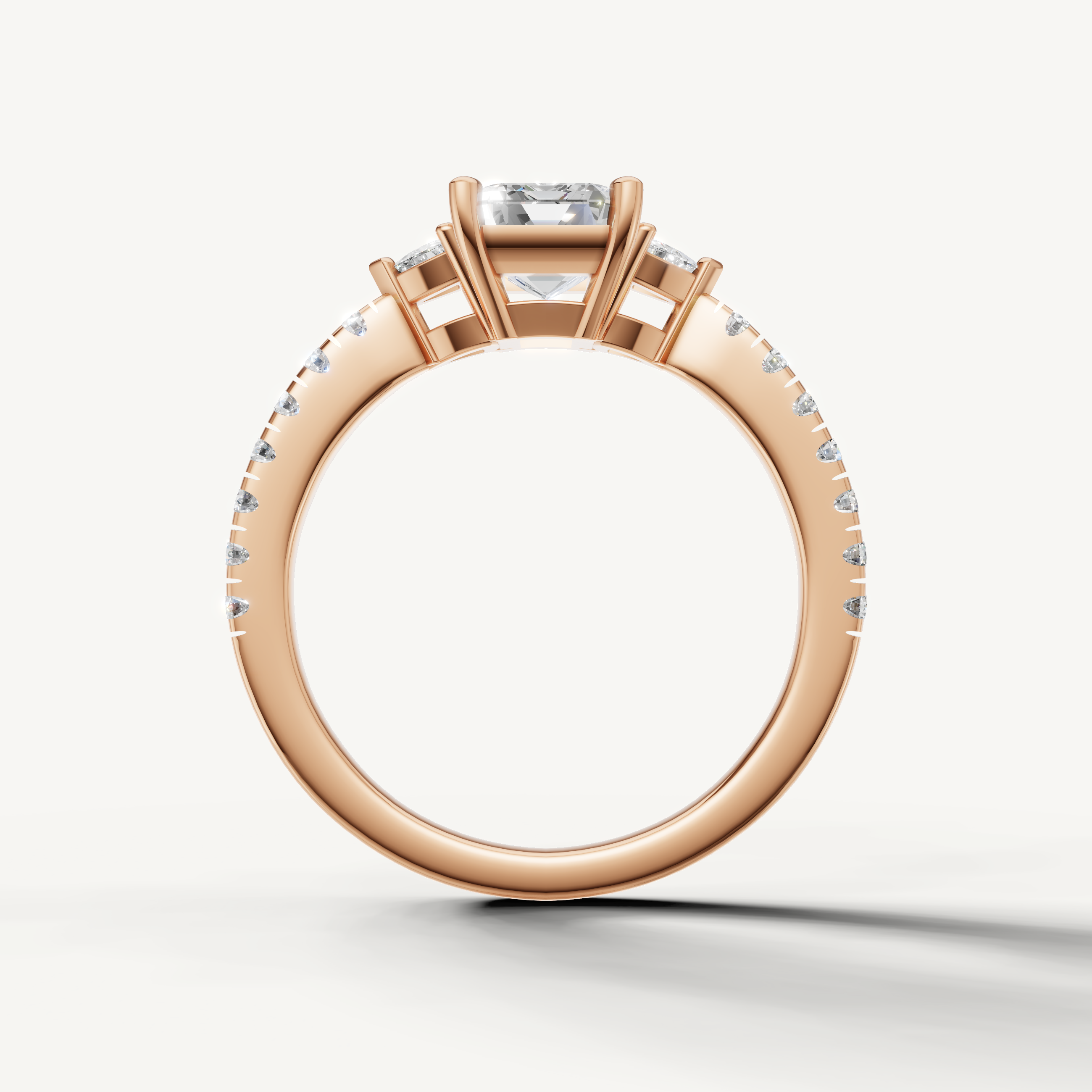 Detailed pavé band with lab grown diamonds on emerald cut engagement ring in 14K gold