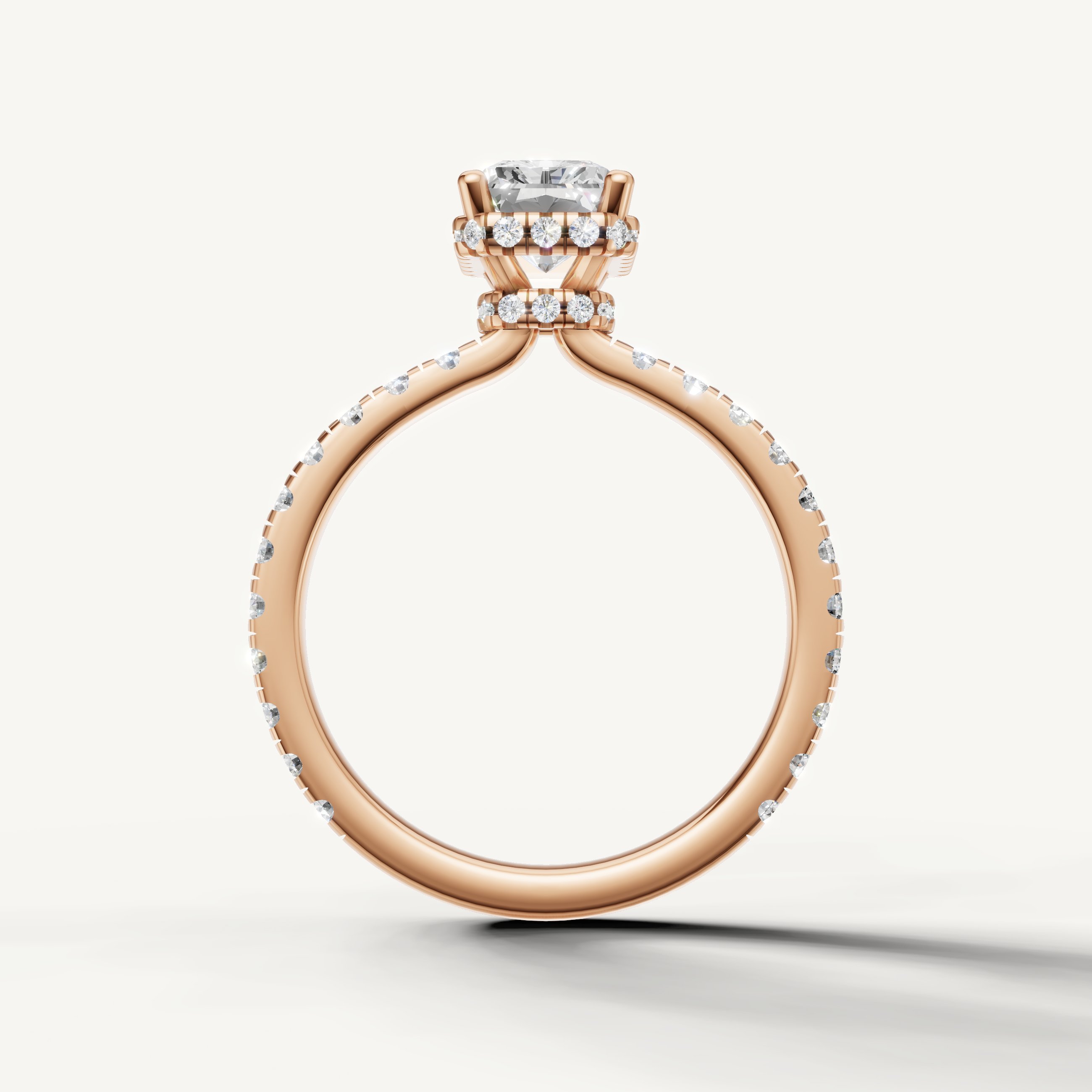 sophisticated radiant cut lab grown diamond hidden halo ring in 14k rose gold with timeless pavé band