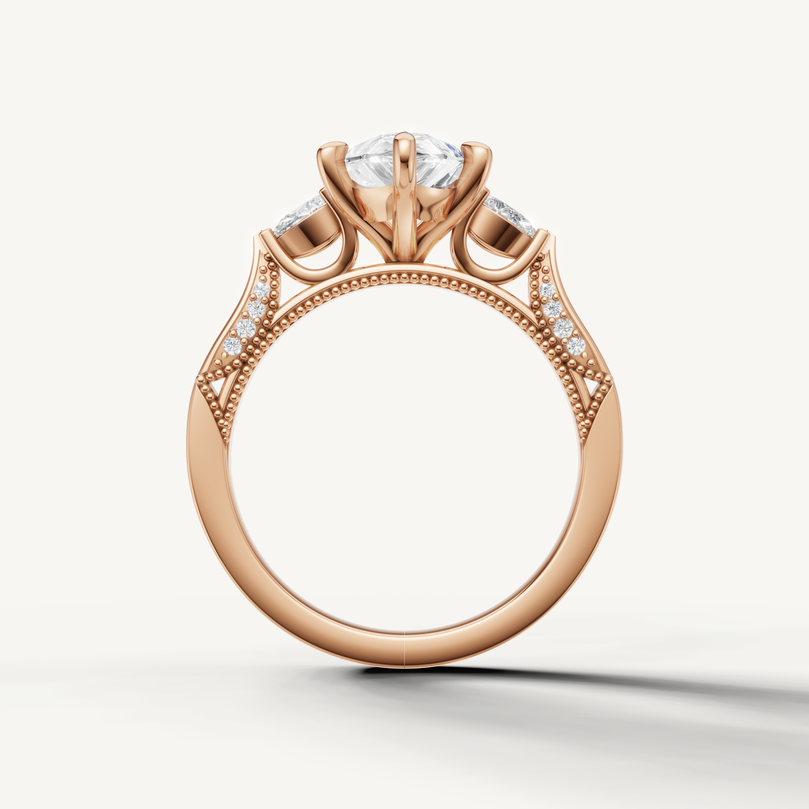 Pear shaped solitaire diamond ring with side pear stones rose gold romantic design