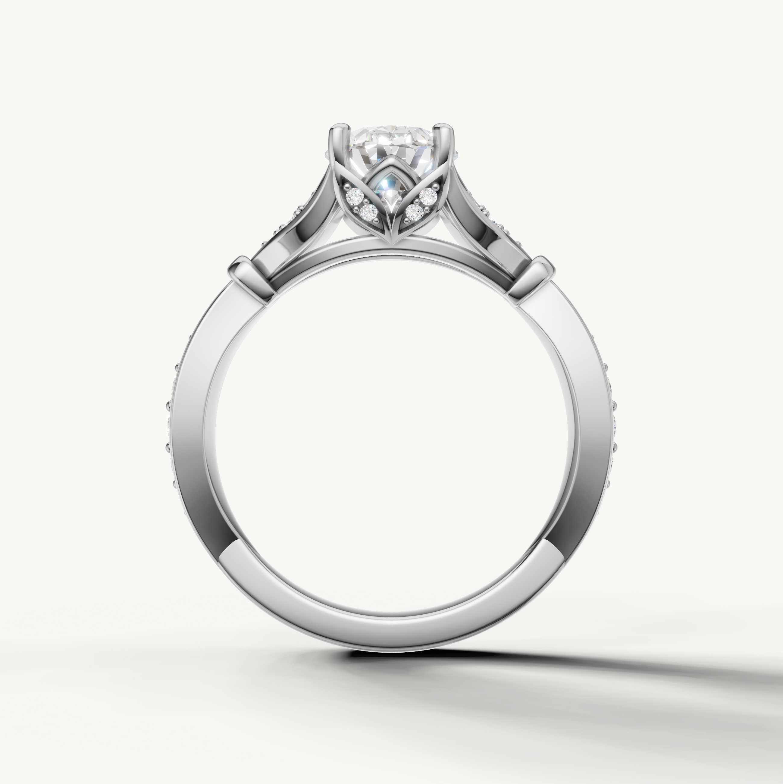 Raul Diamonds white gold oval cut engagement ring with pavé accents and vintage inspired split design