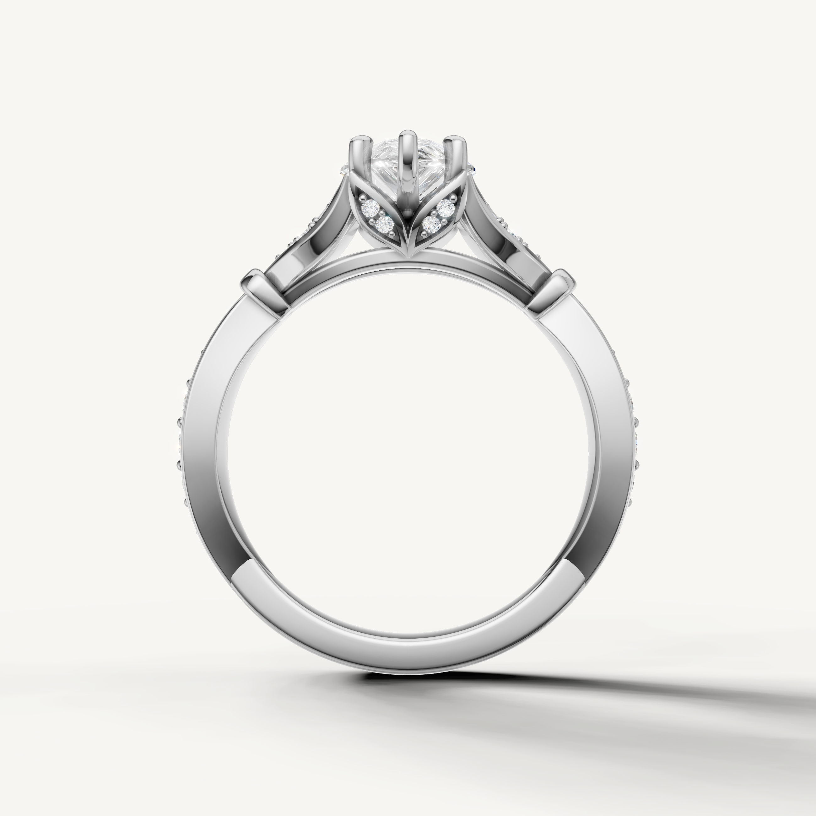 Raul Diamonds white gold pear cut engagement ring with pavé accents and elongated vintage inspired design