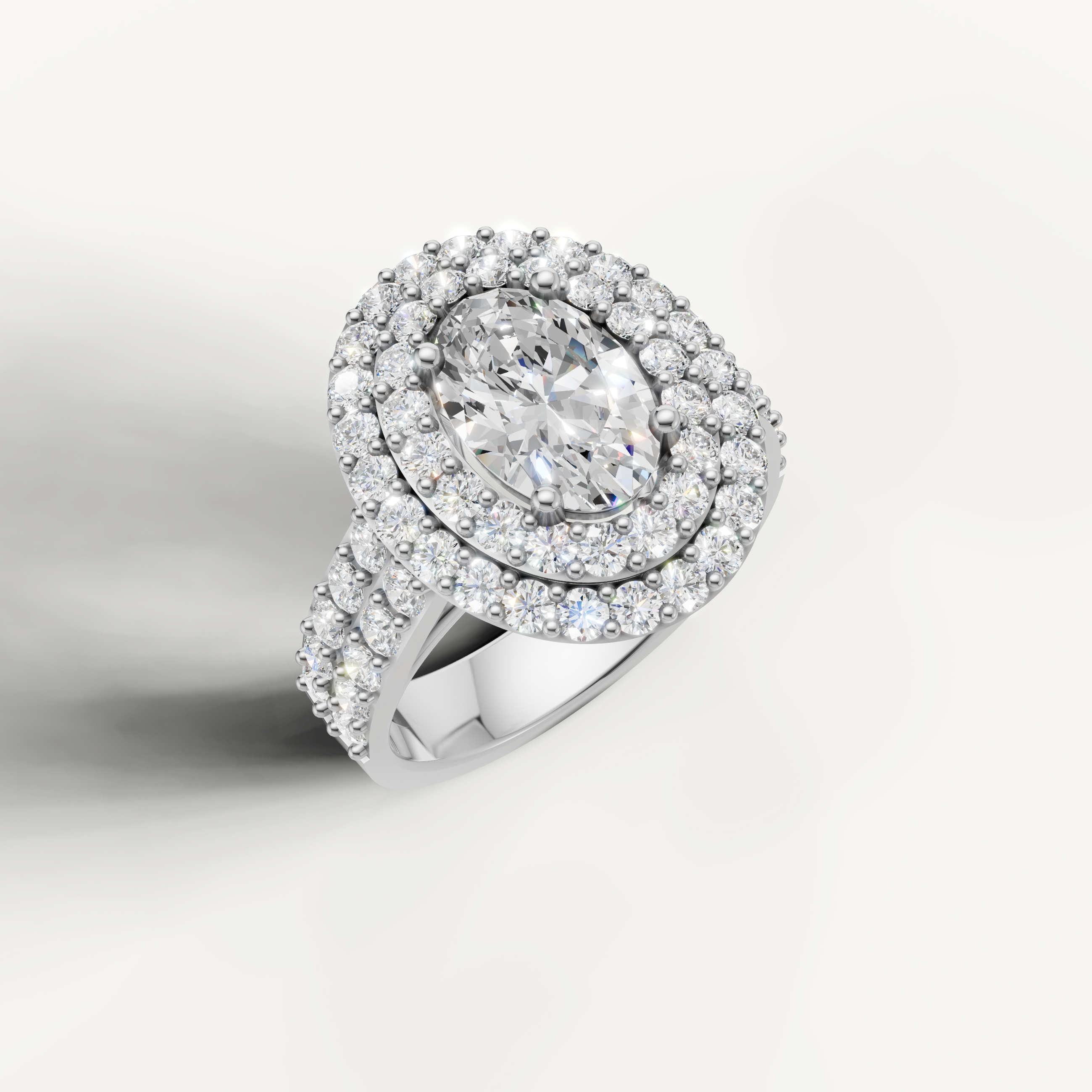 Premium oval diamond ring with double halo and pavé band by Raul Diamonds