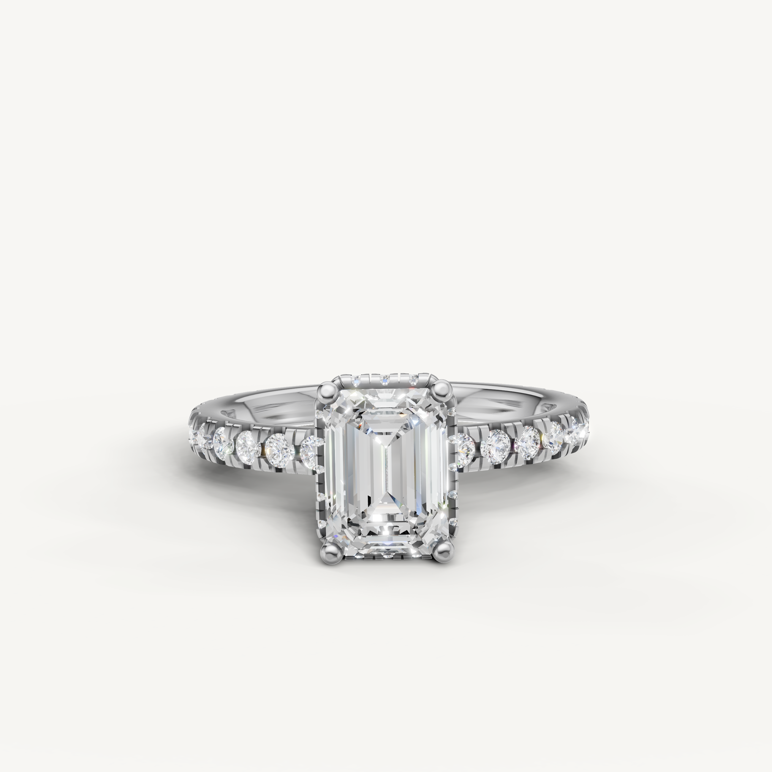 emerald cut lab grown diamond engagement ring with hidden halo and pavé band in 14k white gold