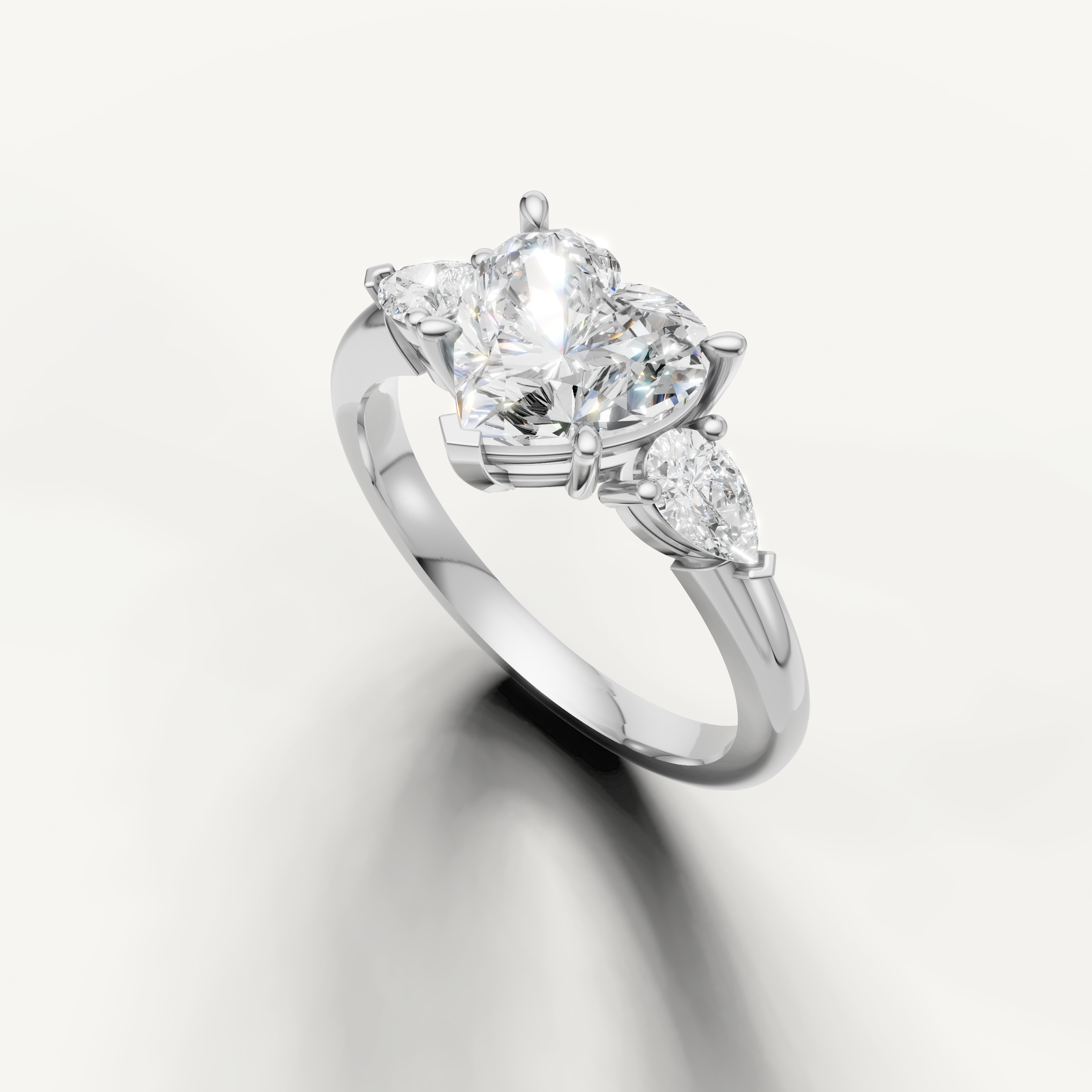 romantic heart diamond ring with pear side stones white gold