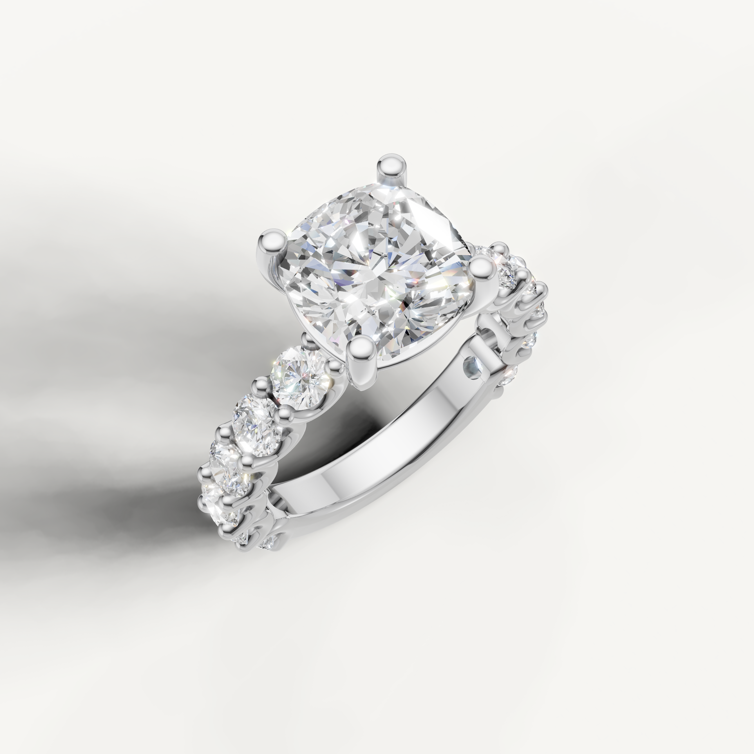 IGI certified cushion lab diamond solitaire ring with scalloped shared prong band white gold