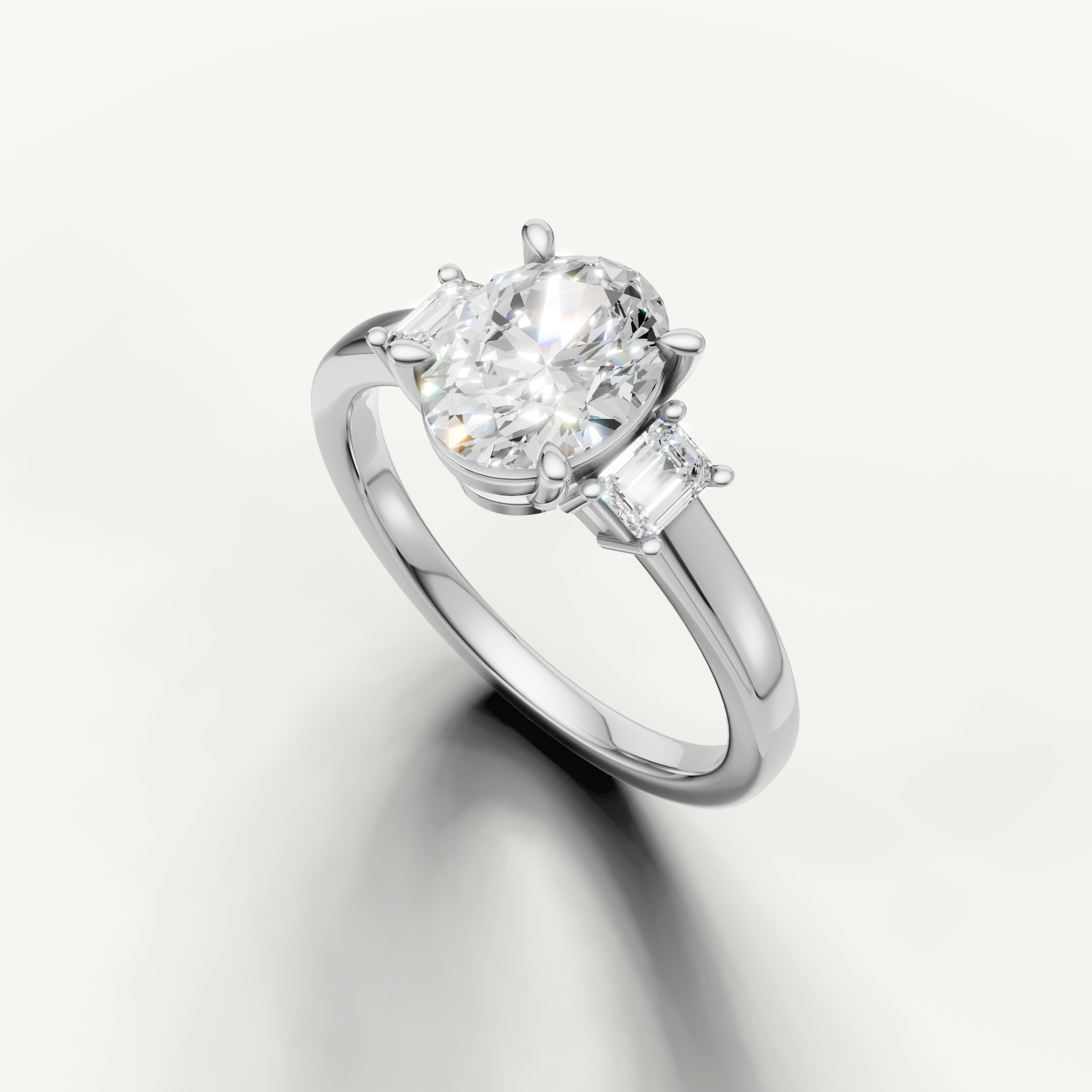 Timeless oval cut three stone lab grown diamond ring in white gold with clean band