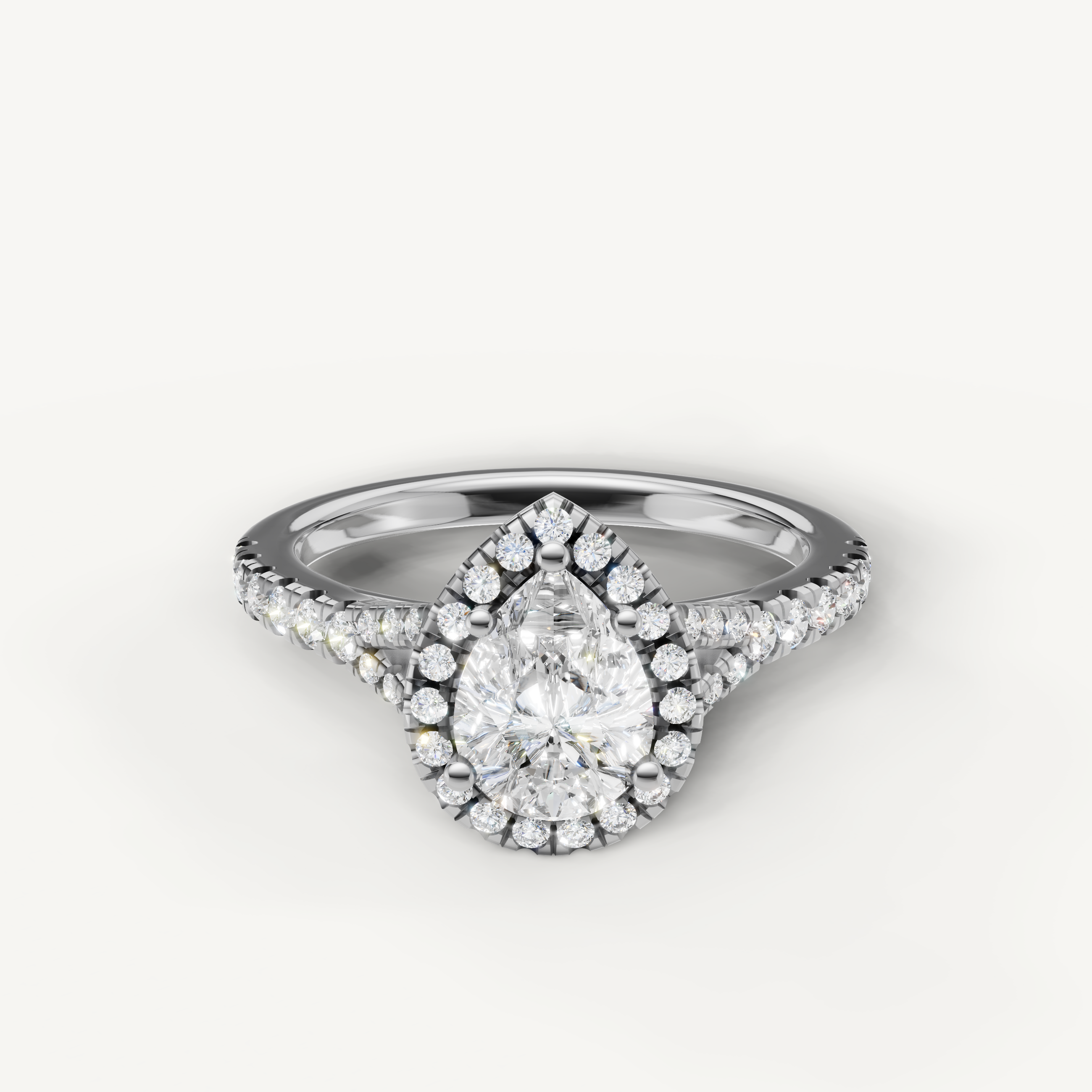 Pear cut halo pavé lab grown diamond engagement ring in 14K white gold