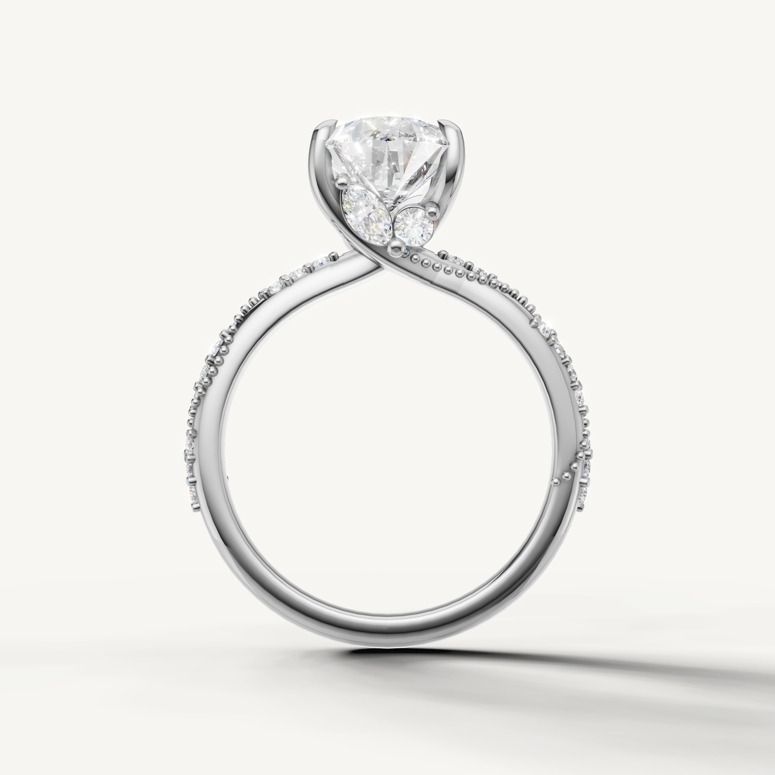 pear diamond engagement ring with elegant crossover pavé band white gold