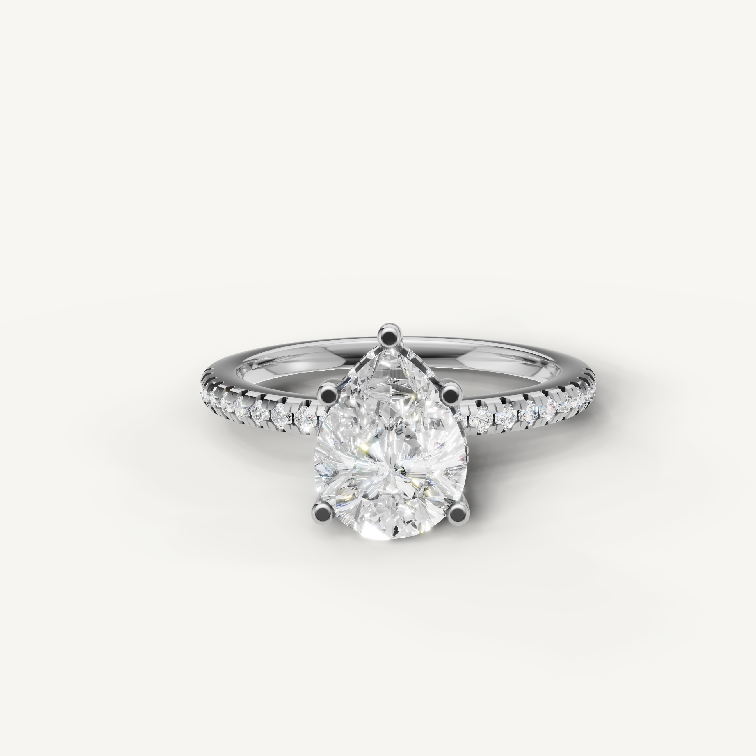 pear cut lab grown diamond engagement ring with pavé band in 14k white gold