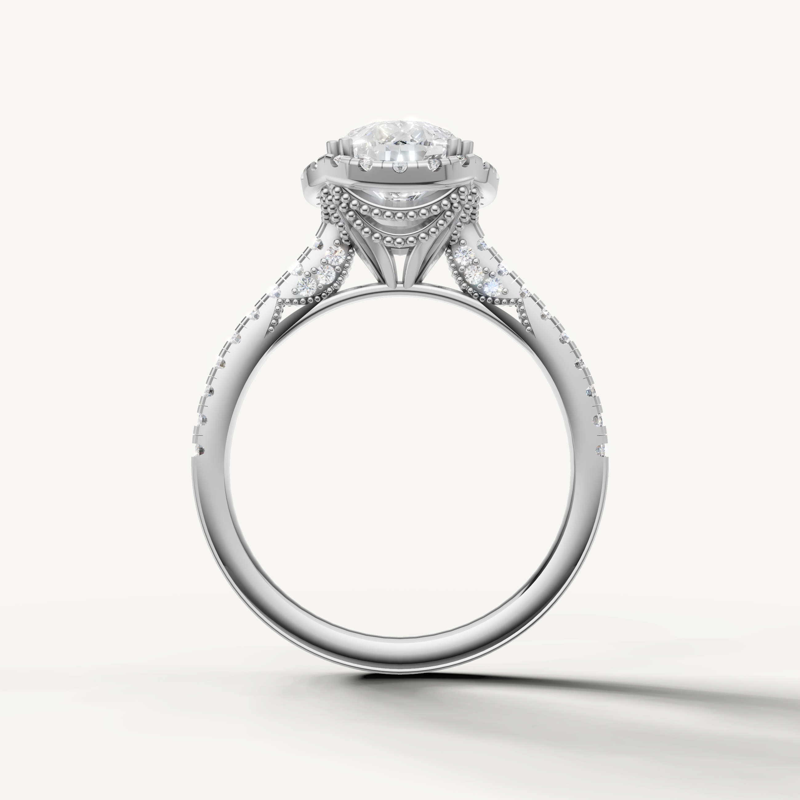 Premium pear cut lab grown diamond halo ring in white gold with elegant pavé detailing by Raul Diamonds