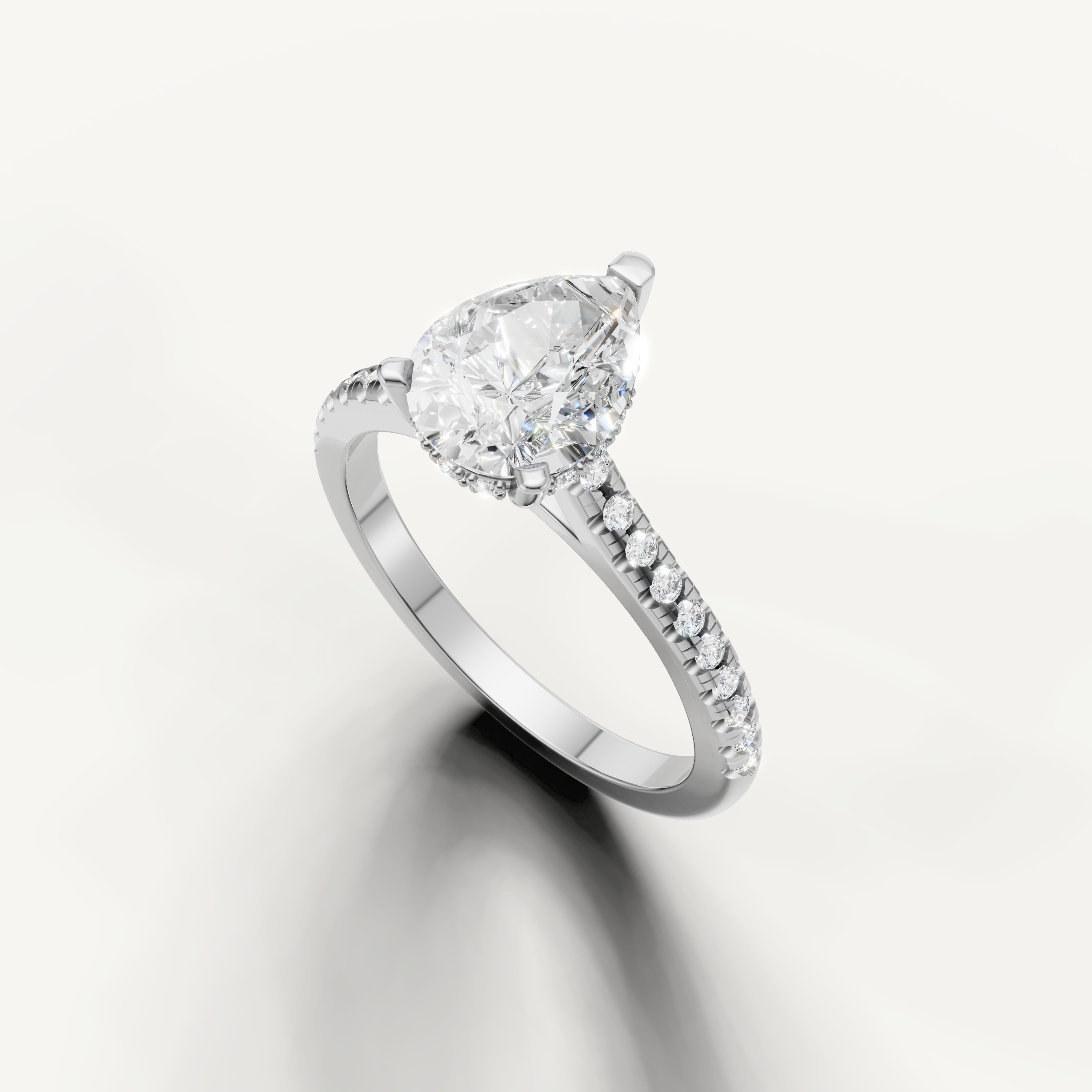 14K white gold pear diamond solitaire engagement ring with slim pavé diamond band