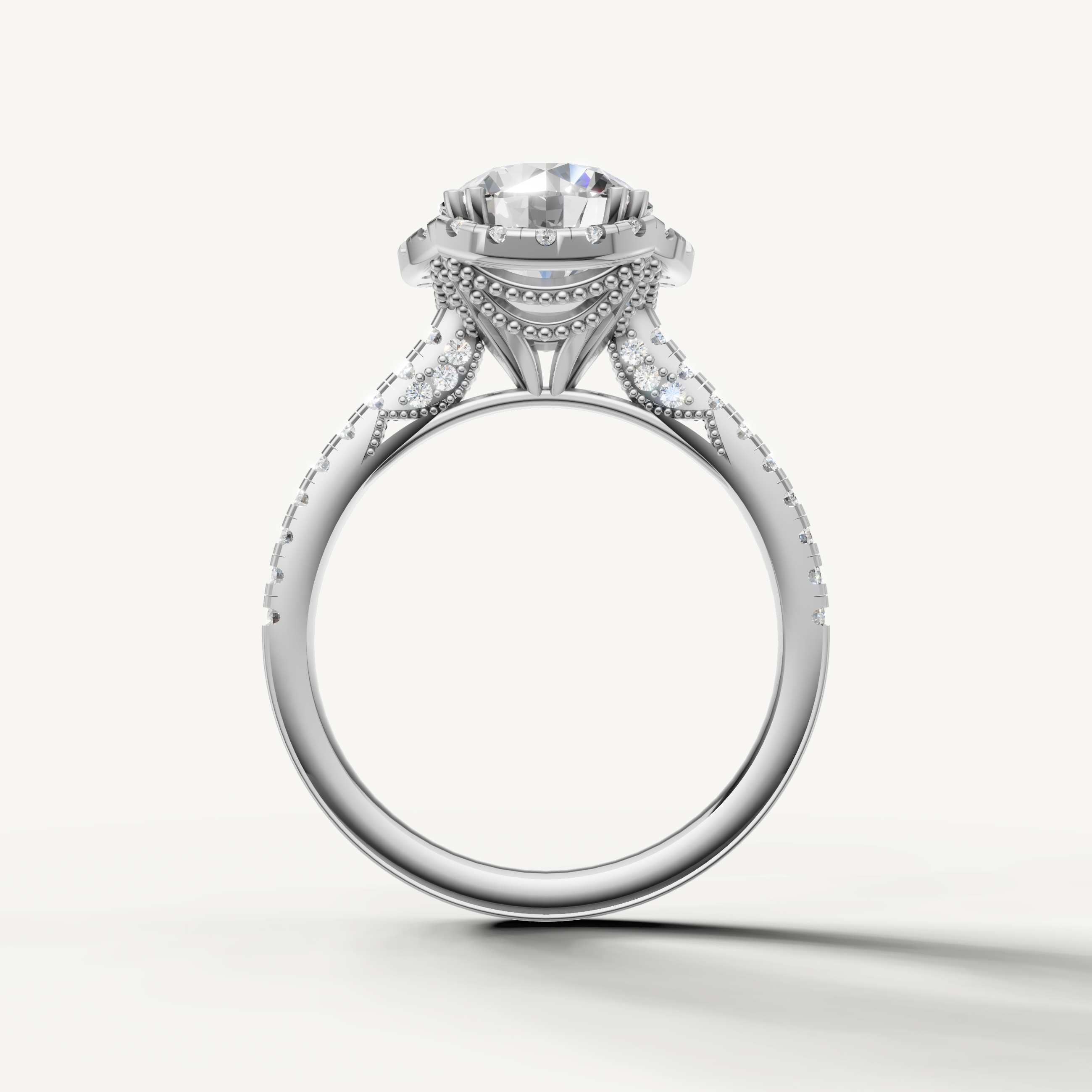 Premium round cut lab grown diamond halo ring in white gold with elegant pavé detailing by Raul Diamonds