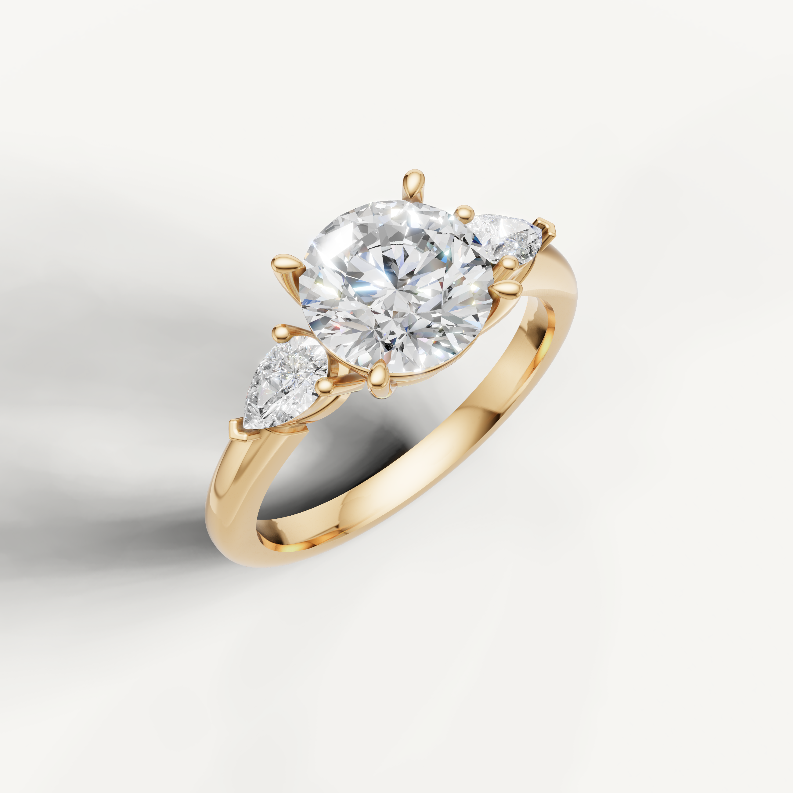 timeless round brilliant lab grown diamond trilogy ring with marquise accents