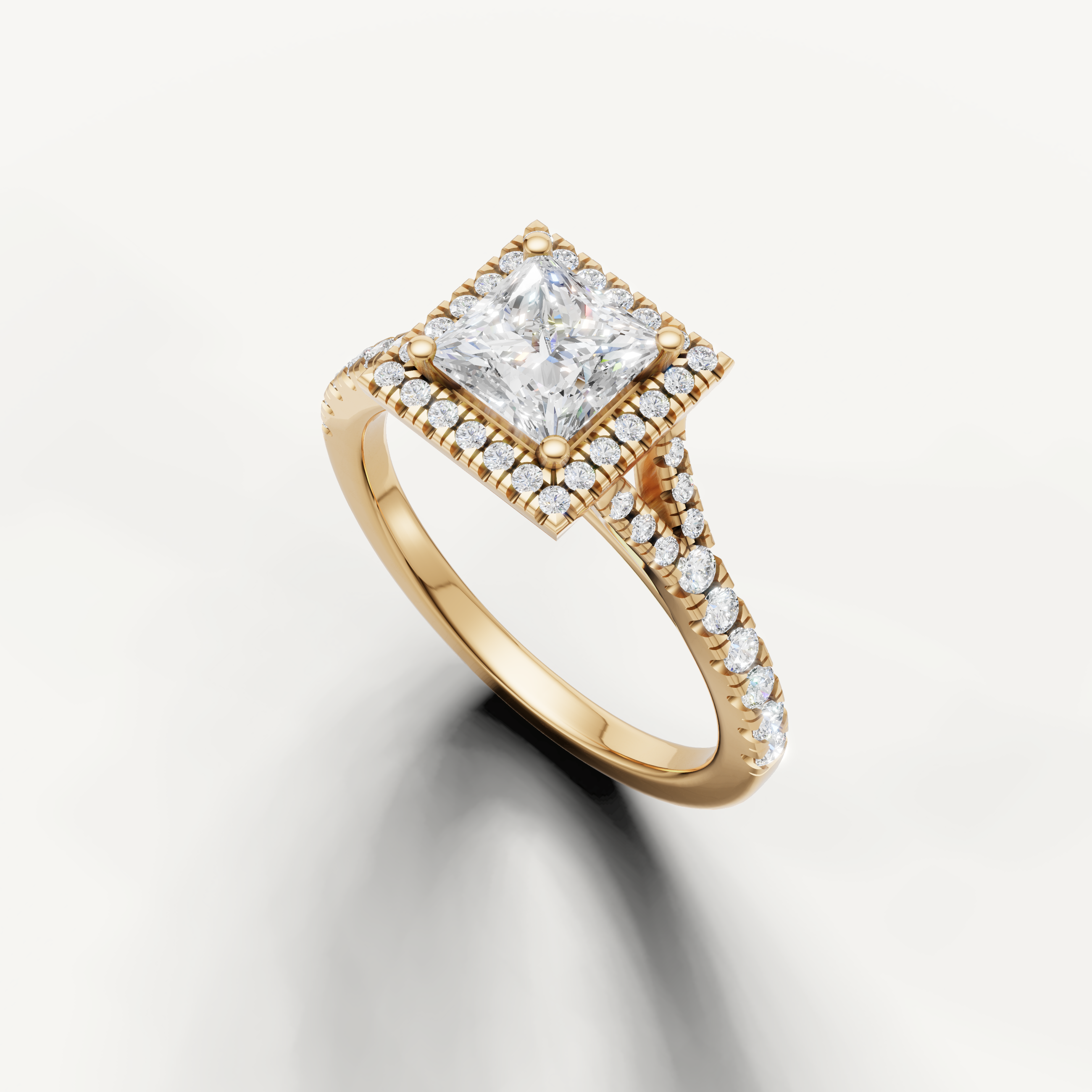 Square princess diamond halo ring with split pavé band yellow gold