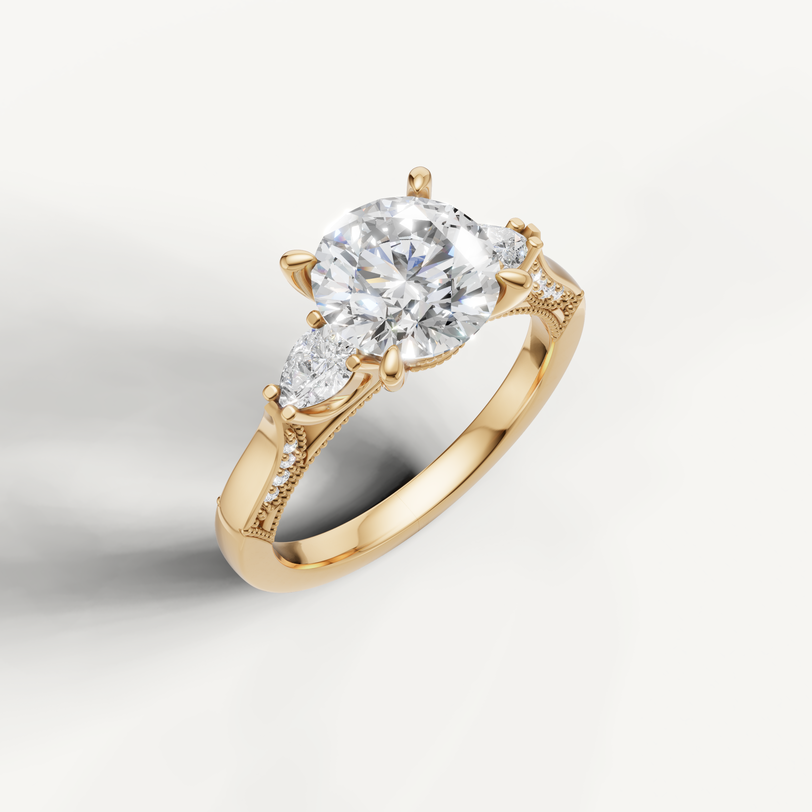 IGI certified round lab diamond ring with pear side accents yellow gold