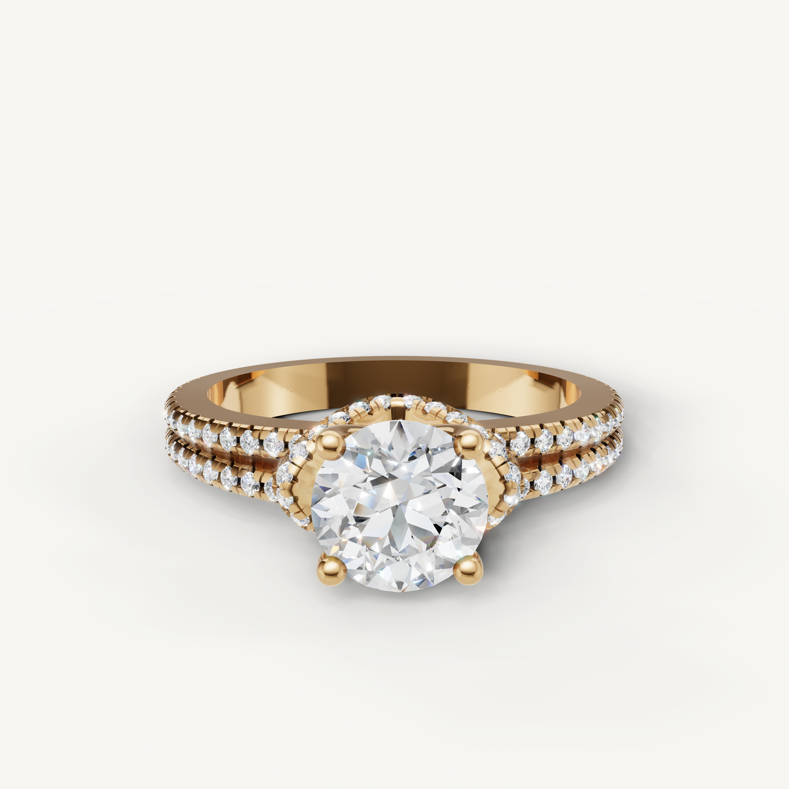 Raul Diamonds round brilliant solitaire engagement ring in yellow gold with double pave split shank design.