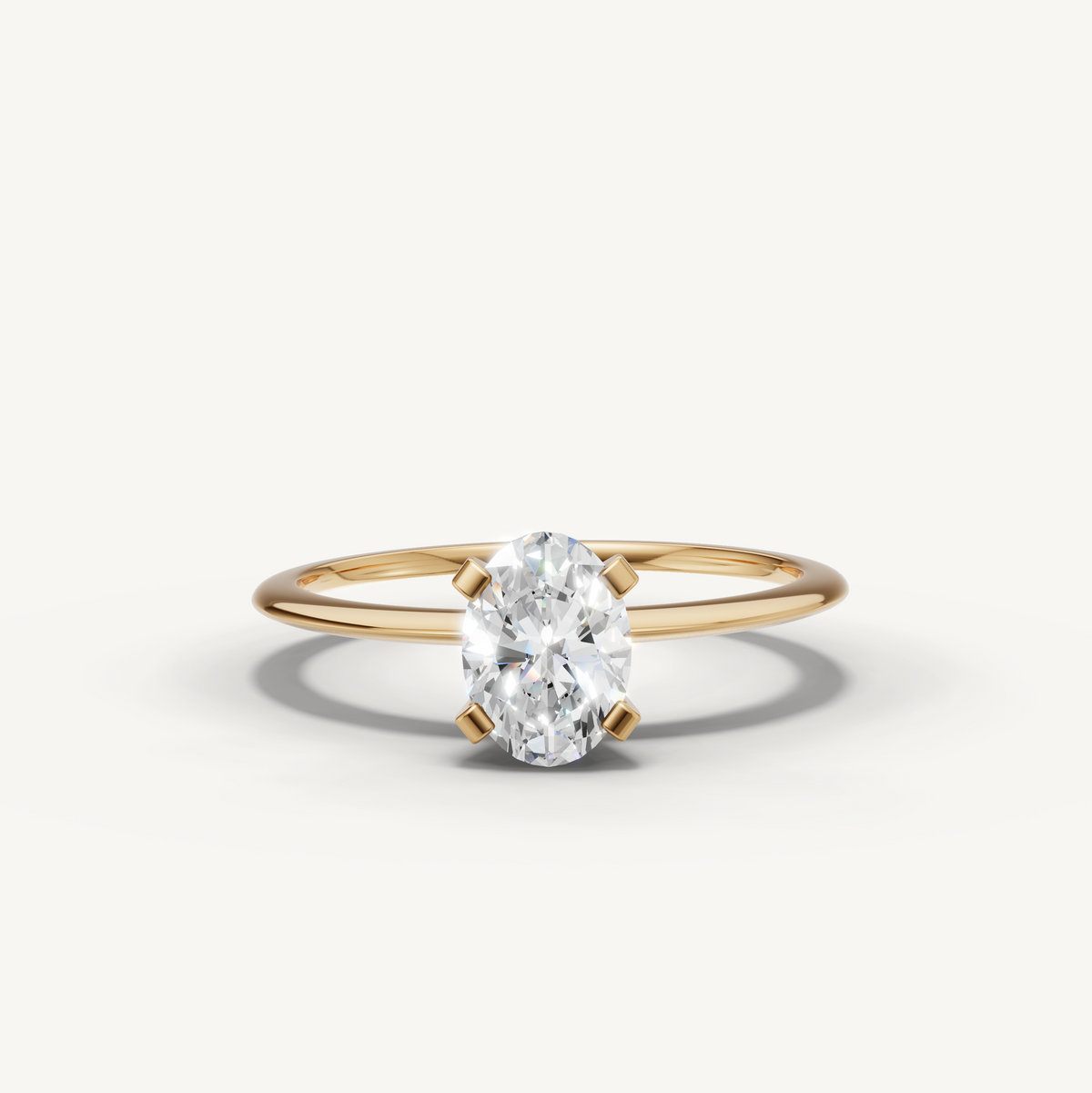 1 carat oval cut lab-grown diamond solitaire ring in 14K yellow gold
