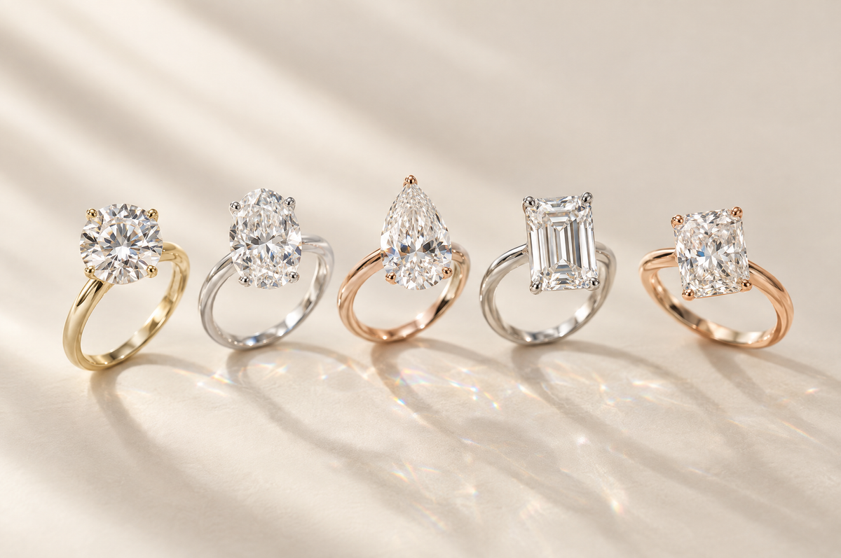 Five lab-grown diamond solitaire engagement rings in different shapes