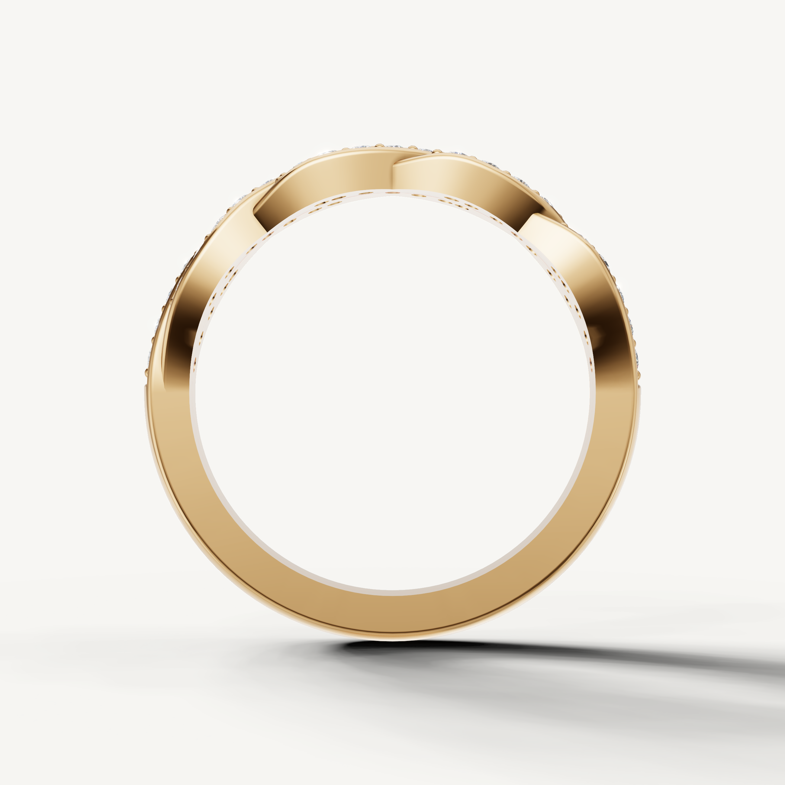 Modern yellow gold braided diamond wedding band with sparkling pavé setting