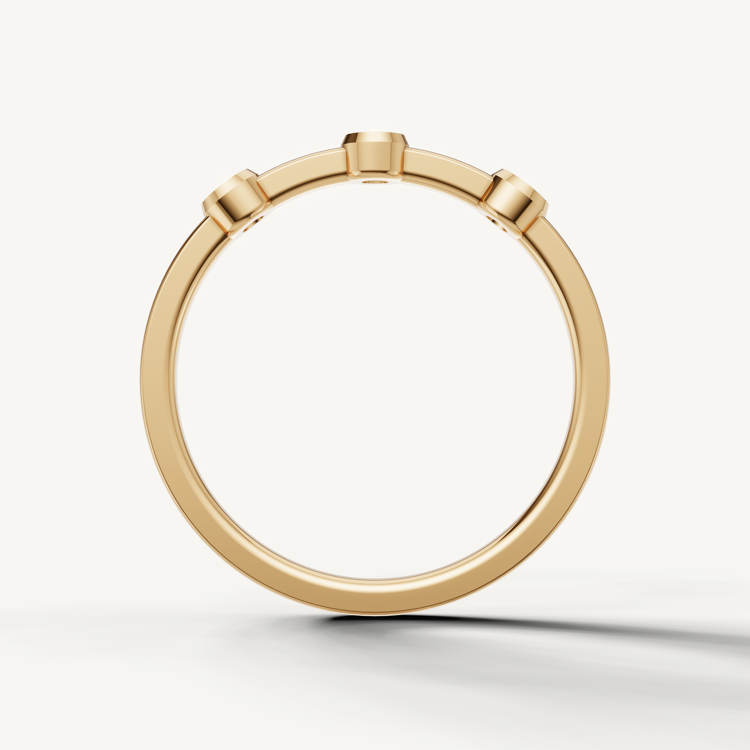 Modern yellow gold bezel diamond anniversary ring with sleek polished finish