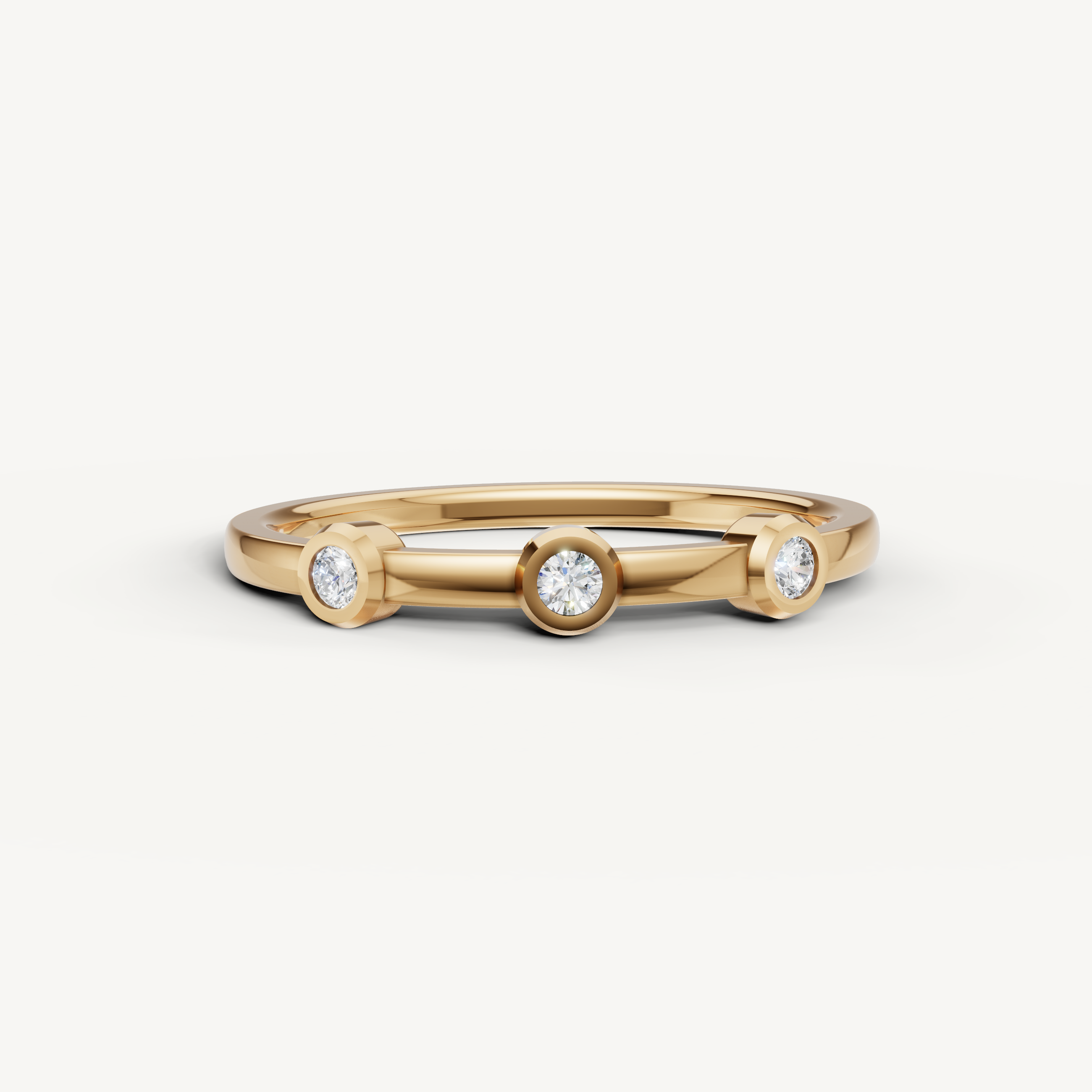 Raul Diamonds yellow gold bezel set diamond wedding band with modern minimalist design