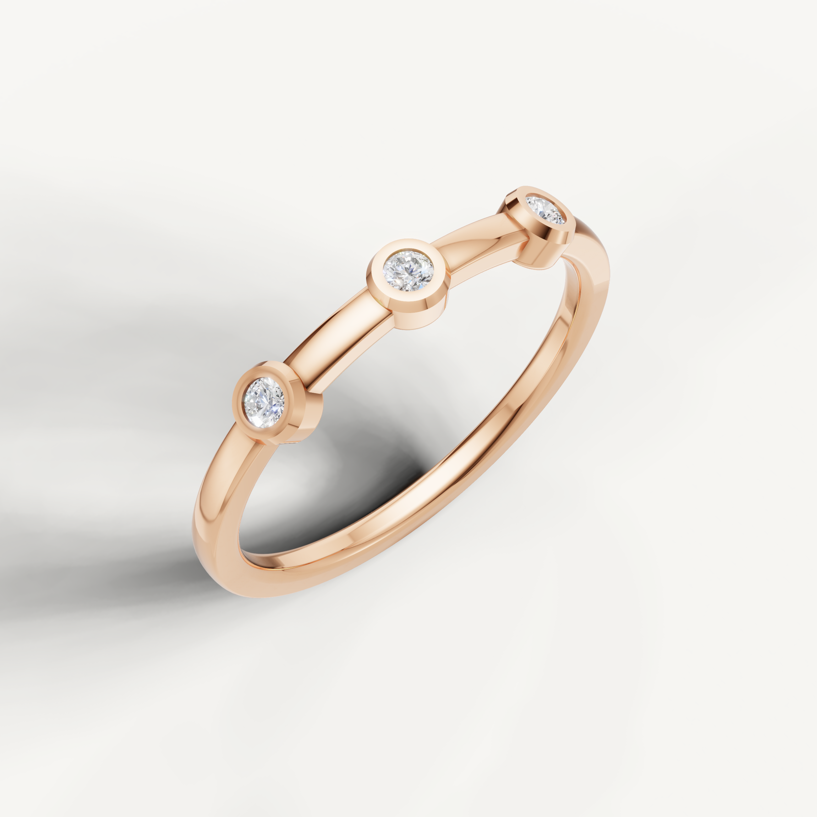 Elegant rose gold three stone diamond wedding ring with modern luxury finish