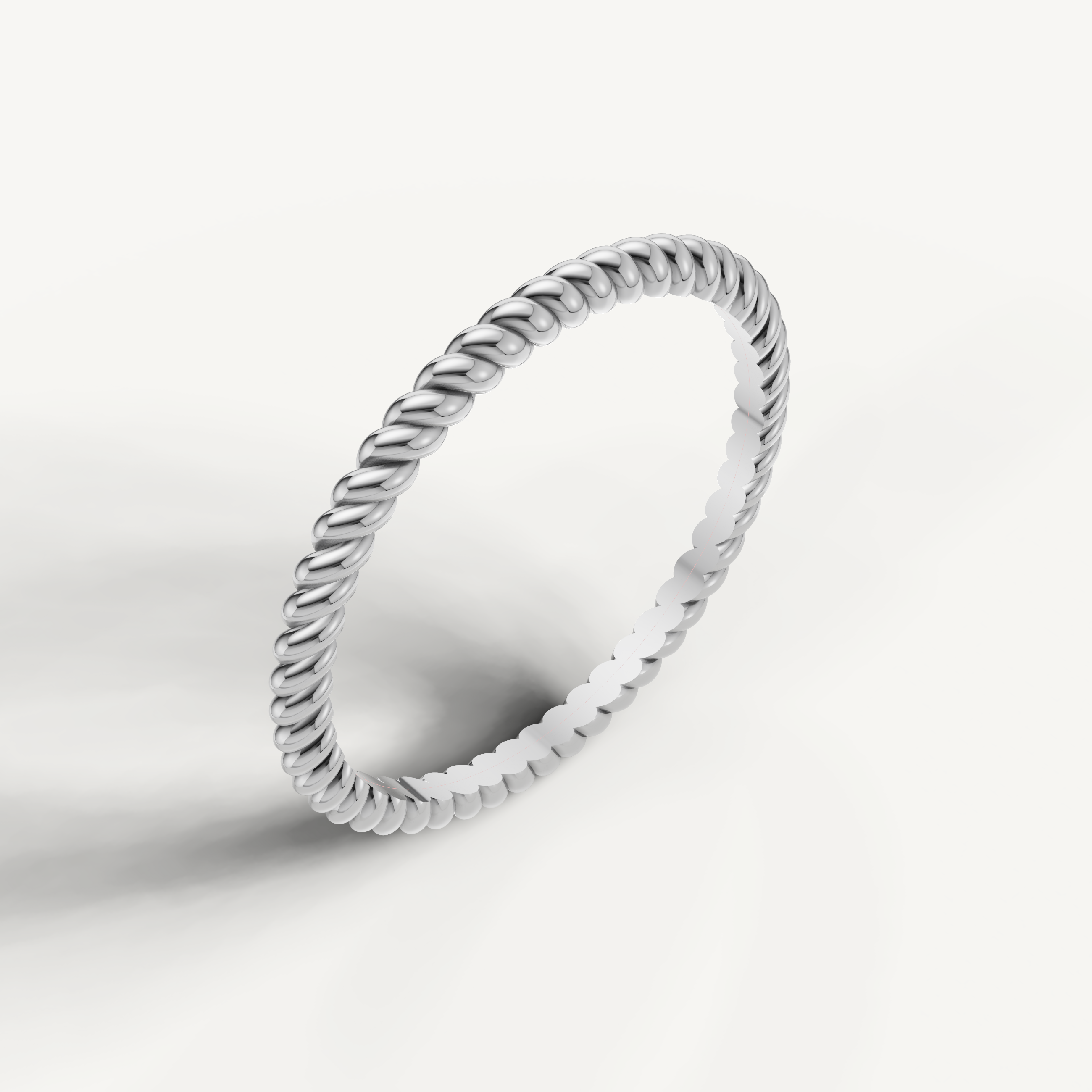 Elegant white gold braided wedding ring with slim stackable profile