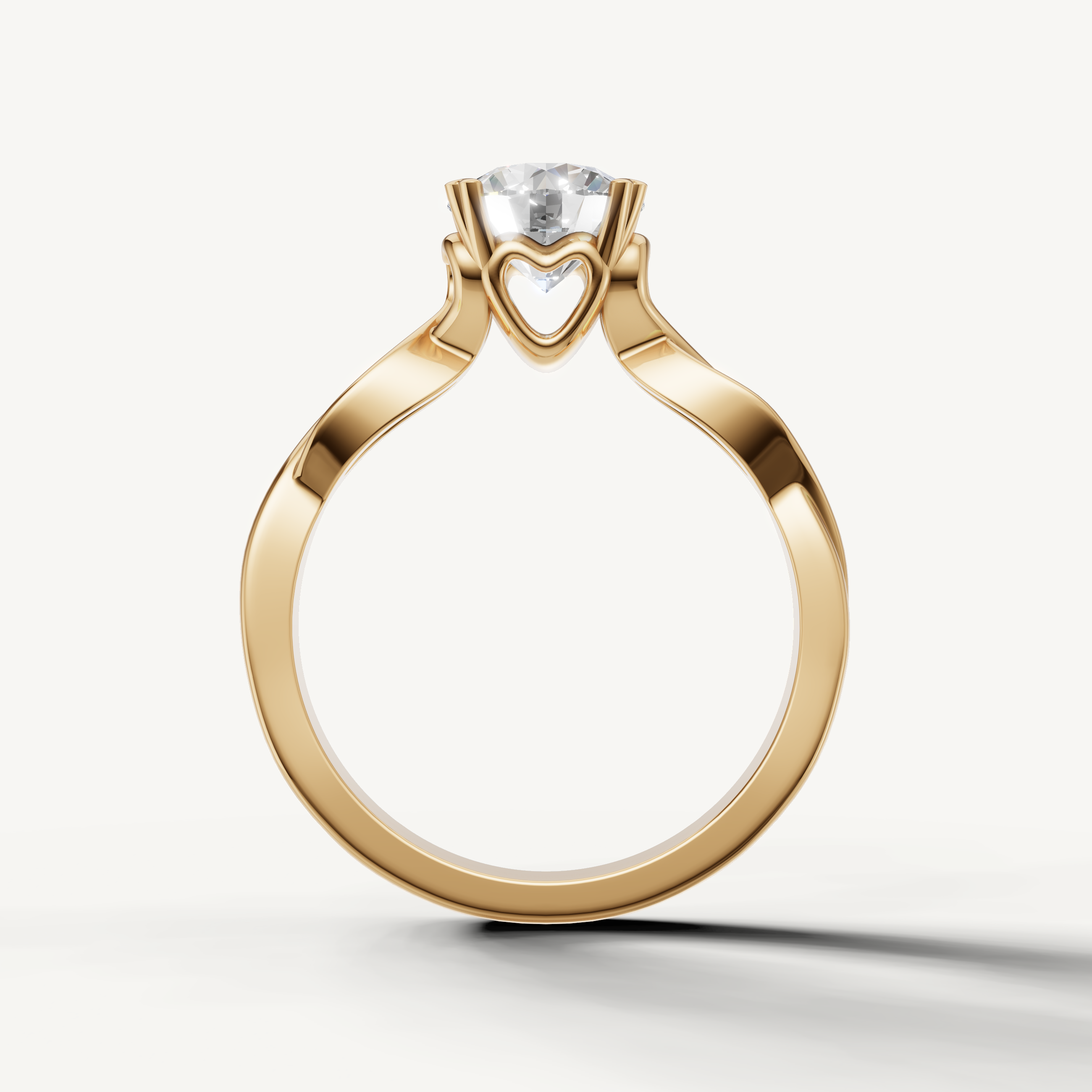Emerald cut diamond solitaire ring with flowing gold band from Raul Diamonds.