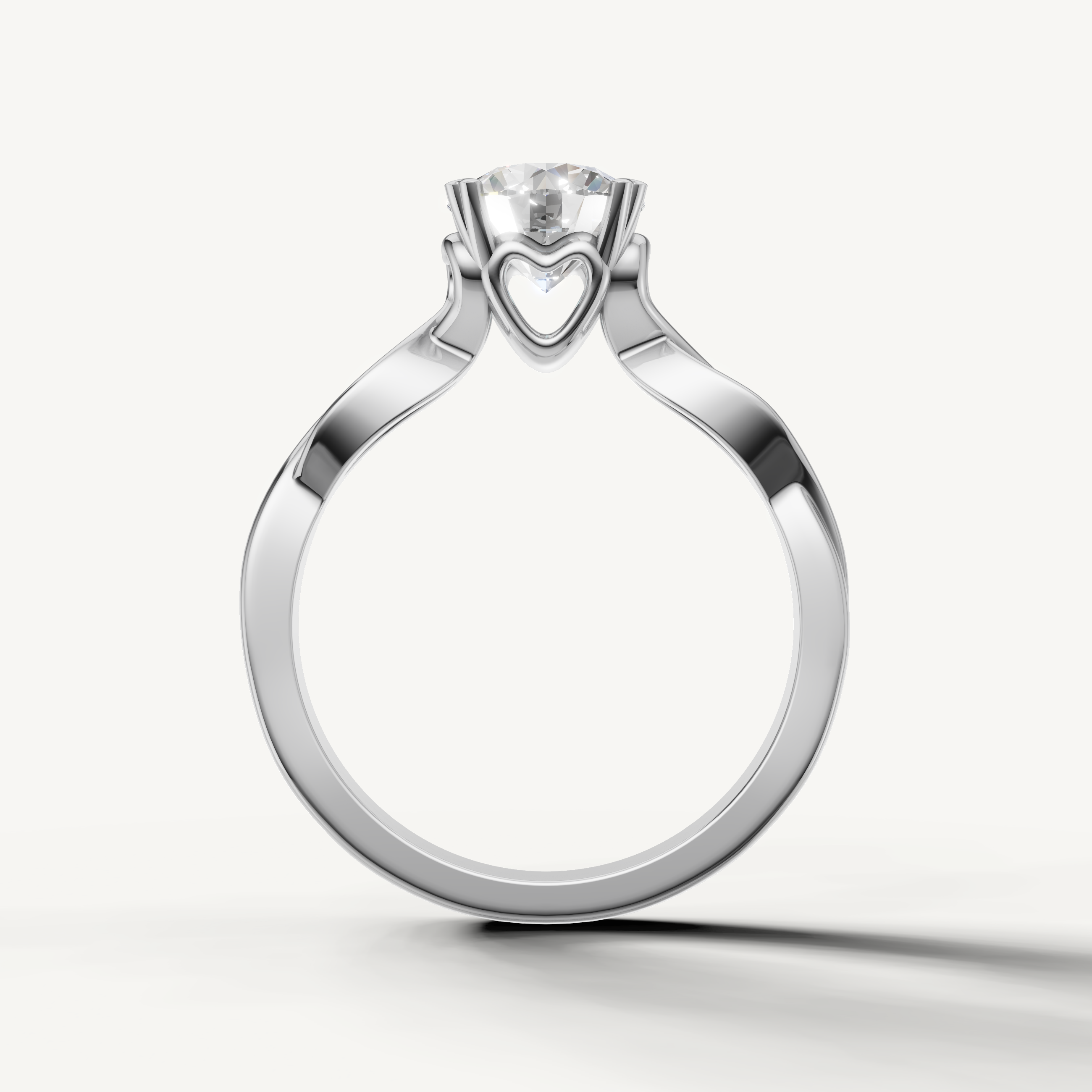 White gold emerald cut solitaire ring with flowing modern band by Raul Diamonds.