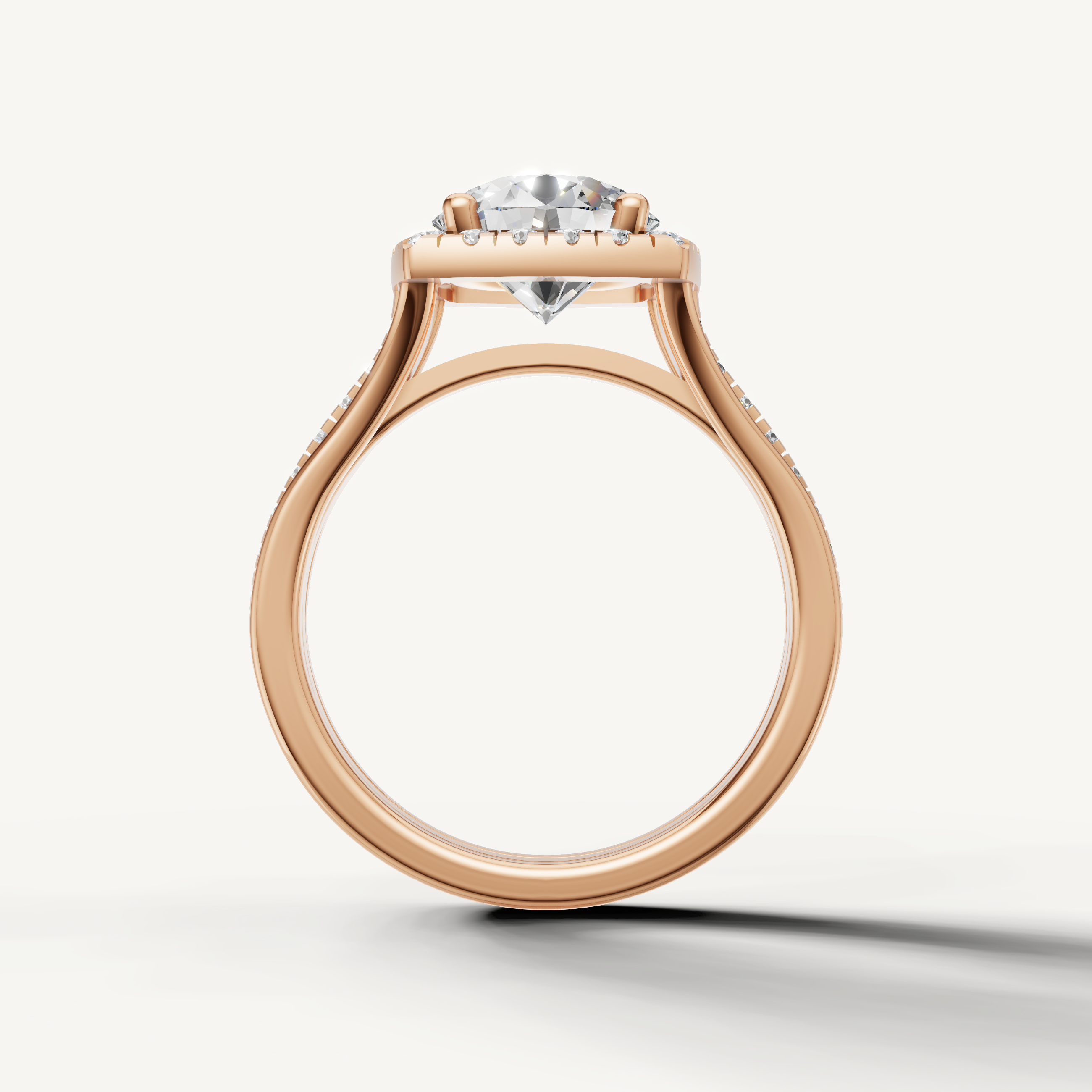 Rose gold round cut diamond ring with split shank design by Raul Diamonds.
