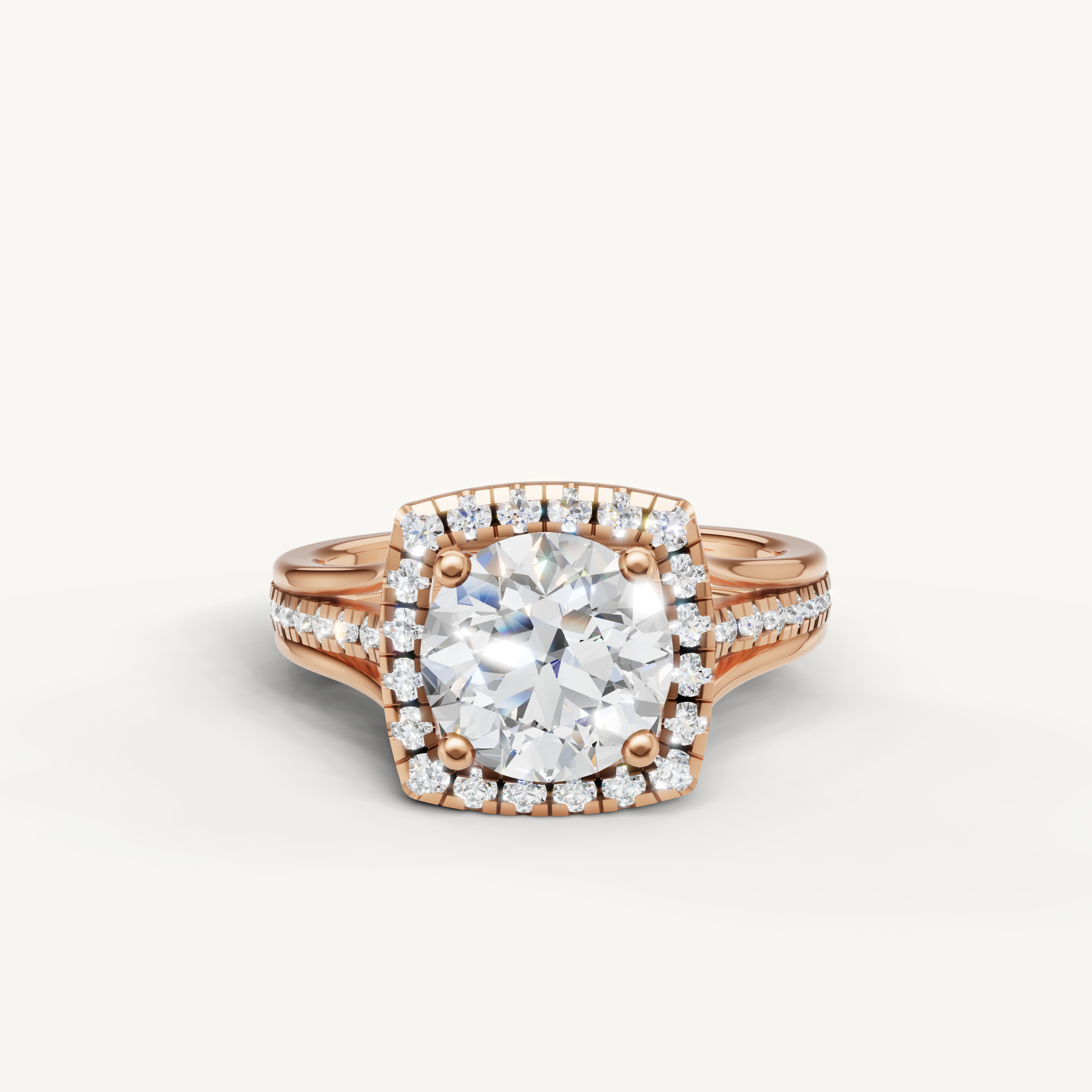 Raul Diamonds round halo engagement ring in rose gold with pavé diamond accents.
