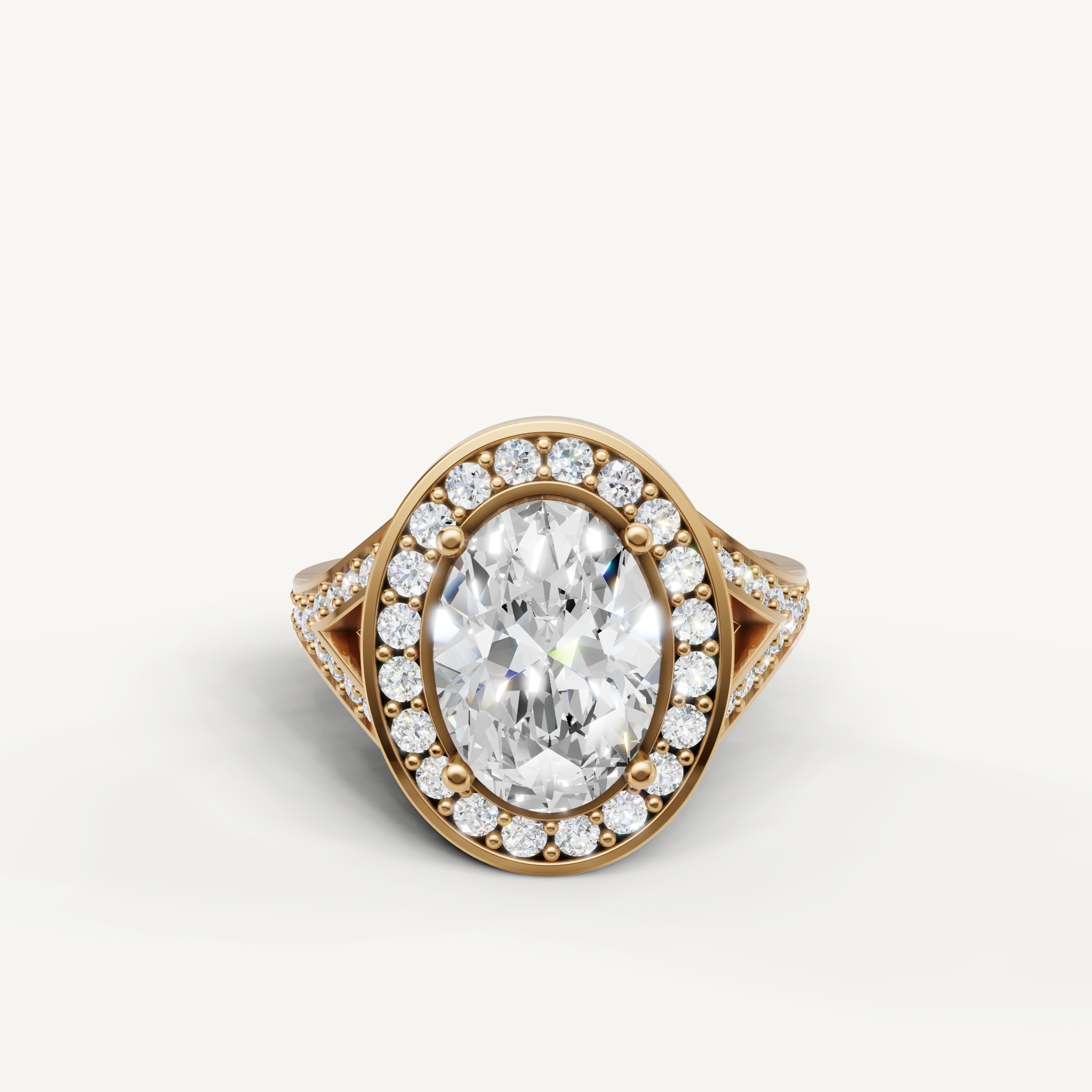 Raul Diamonds oval halo engagement ring in yellow gold with pavé diamond band.