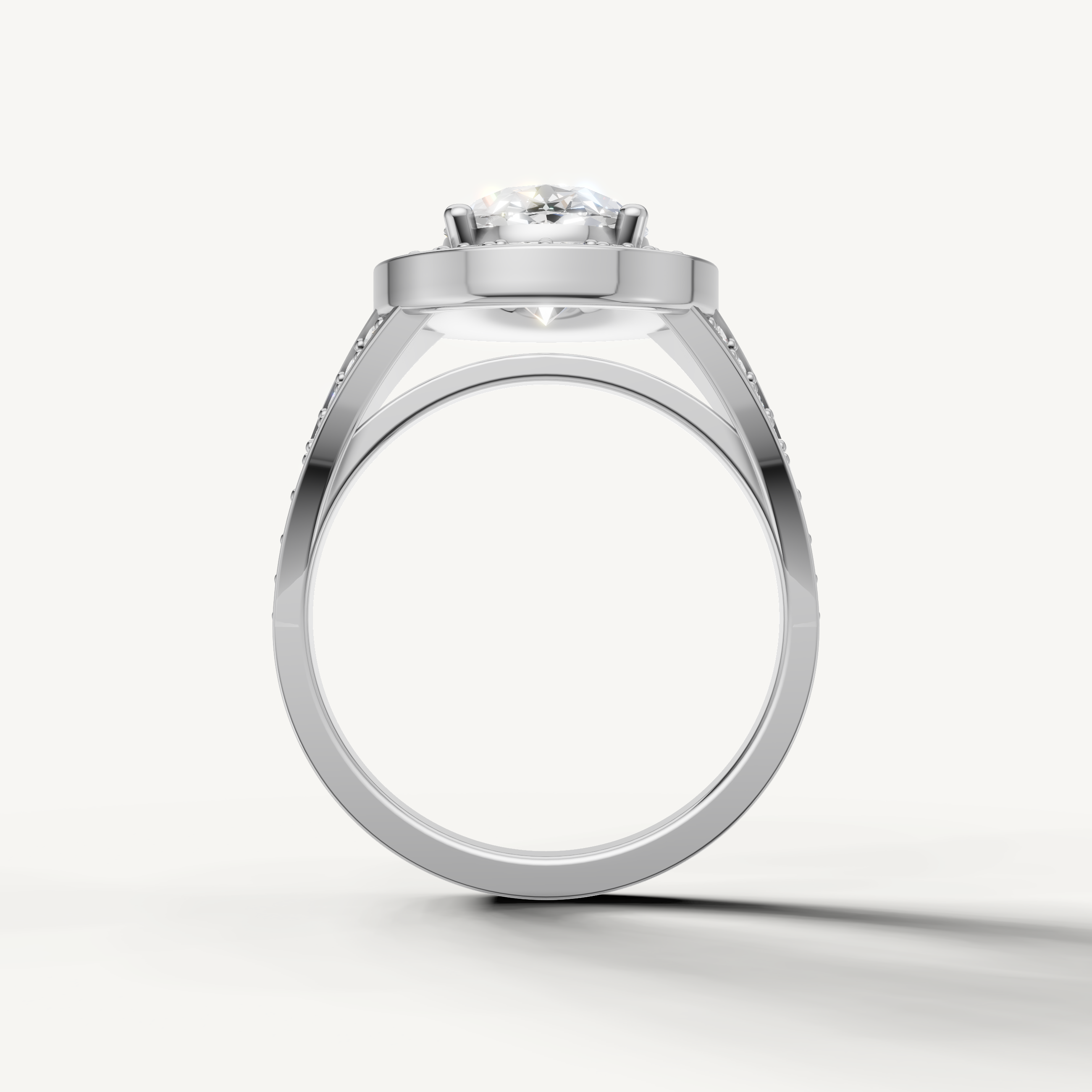 White gold oval brilliant engagement ring with vintage inspired halo by Raul Diamonds.