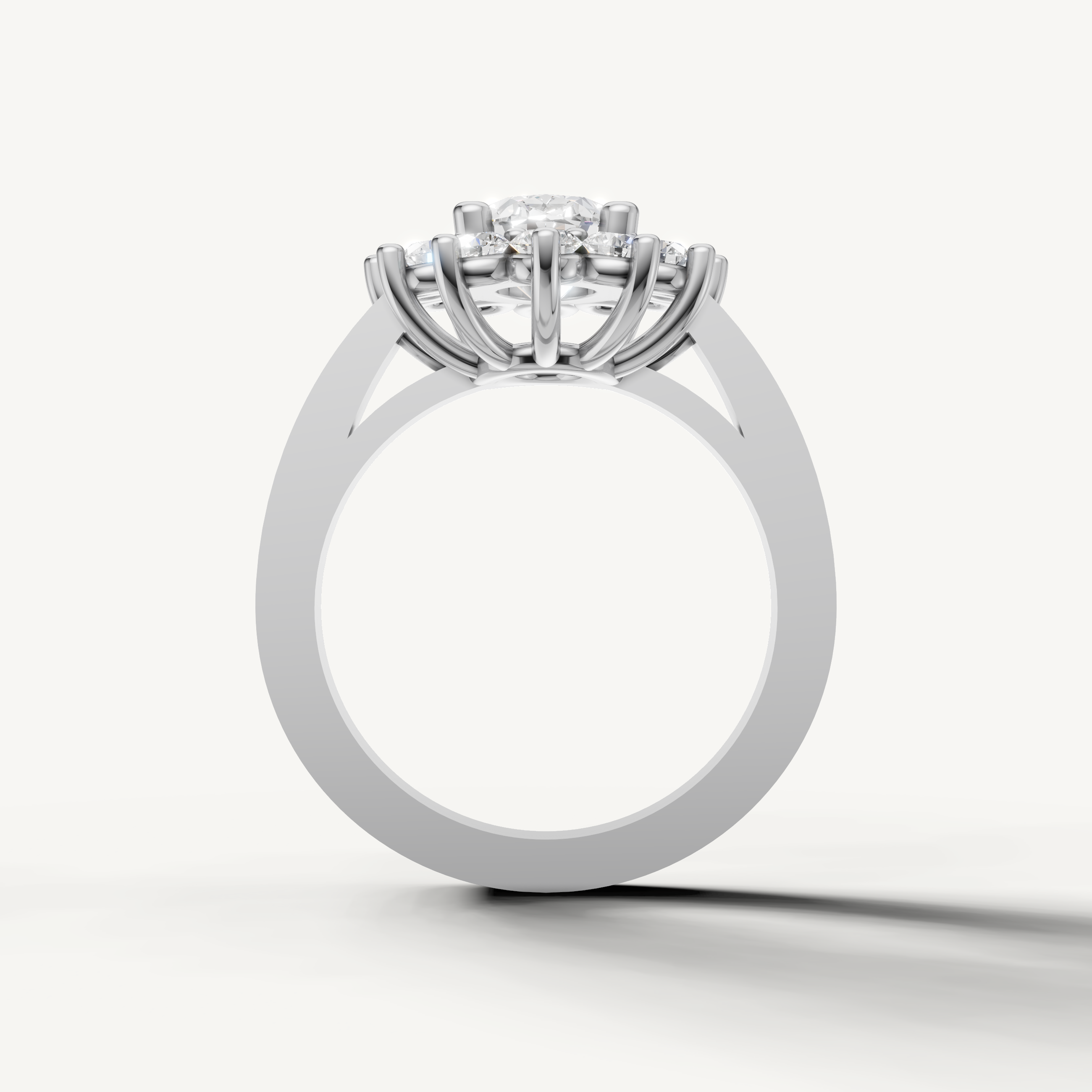 White gold oval diamond ring with pavé band and halo diamonds