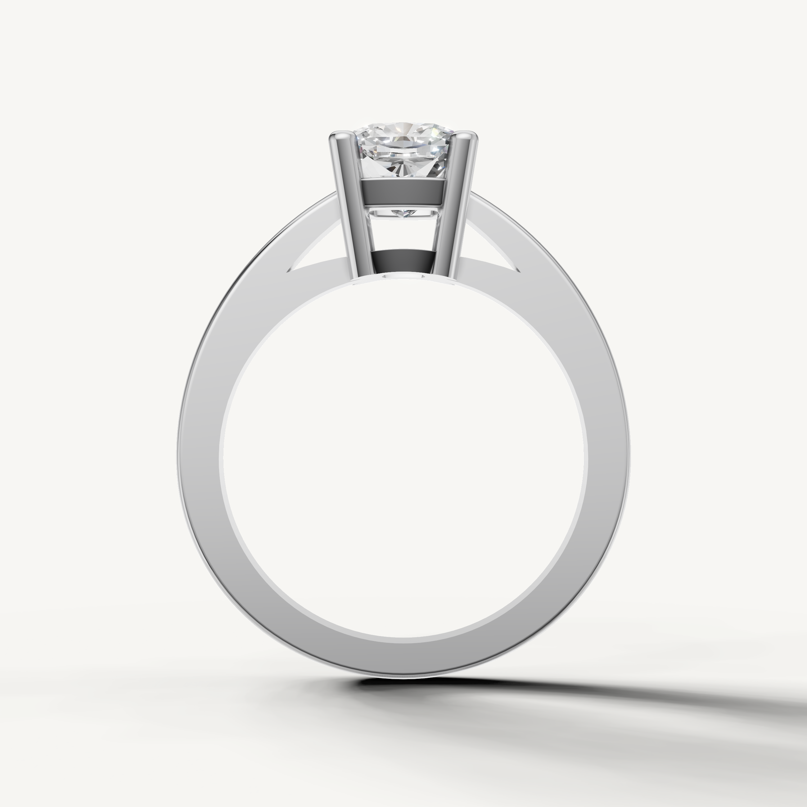 White gold cushion solitaire ring with polished classic band