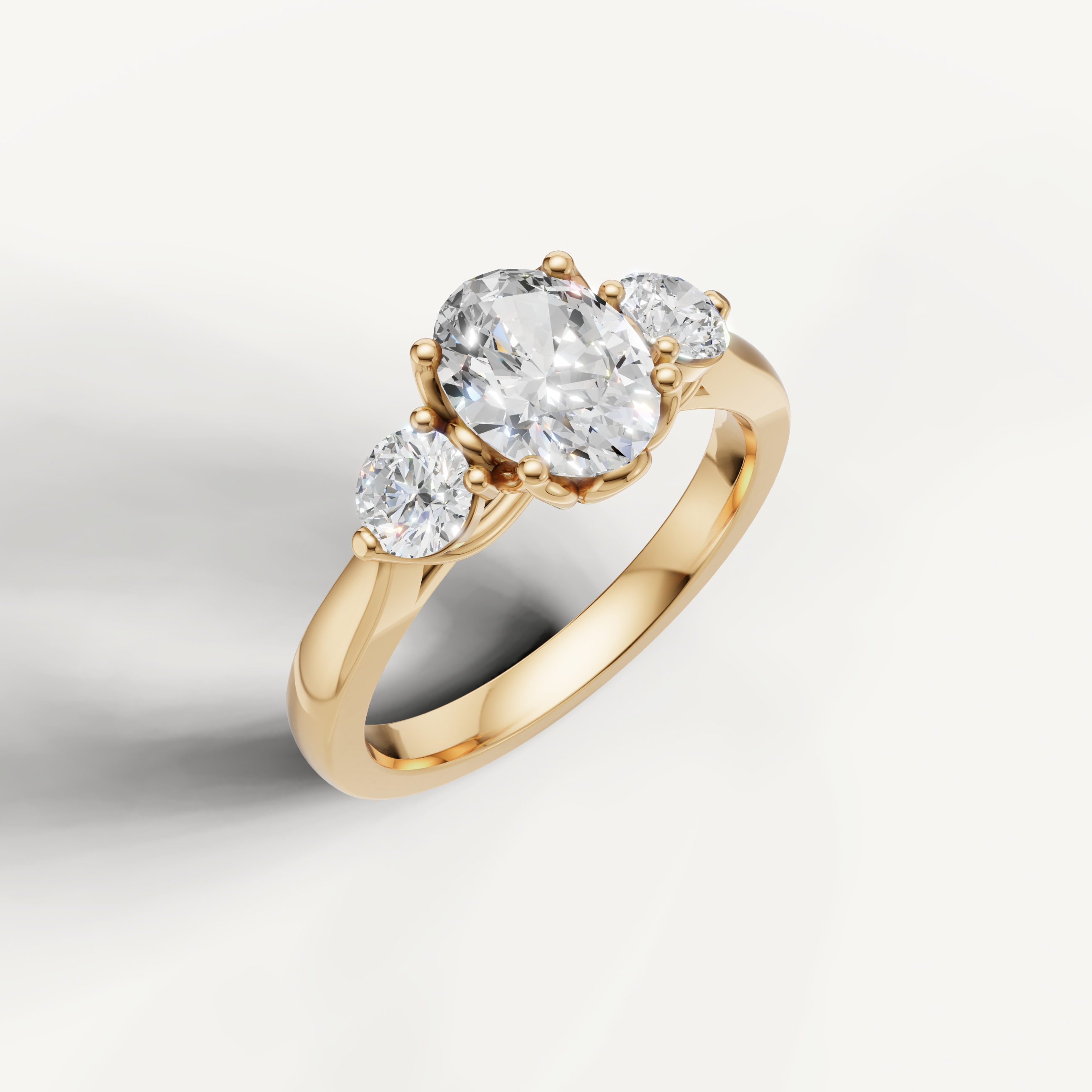Yellow Gold Oval Diamond Engagement Ring with Side Stones by Raul Diamonds