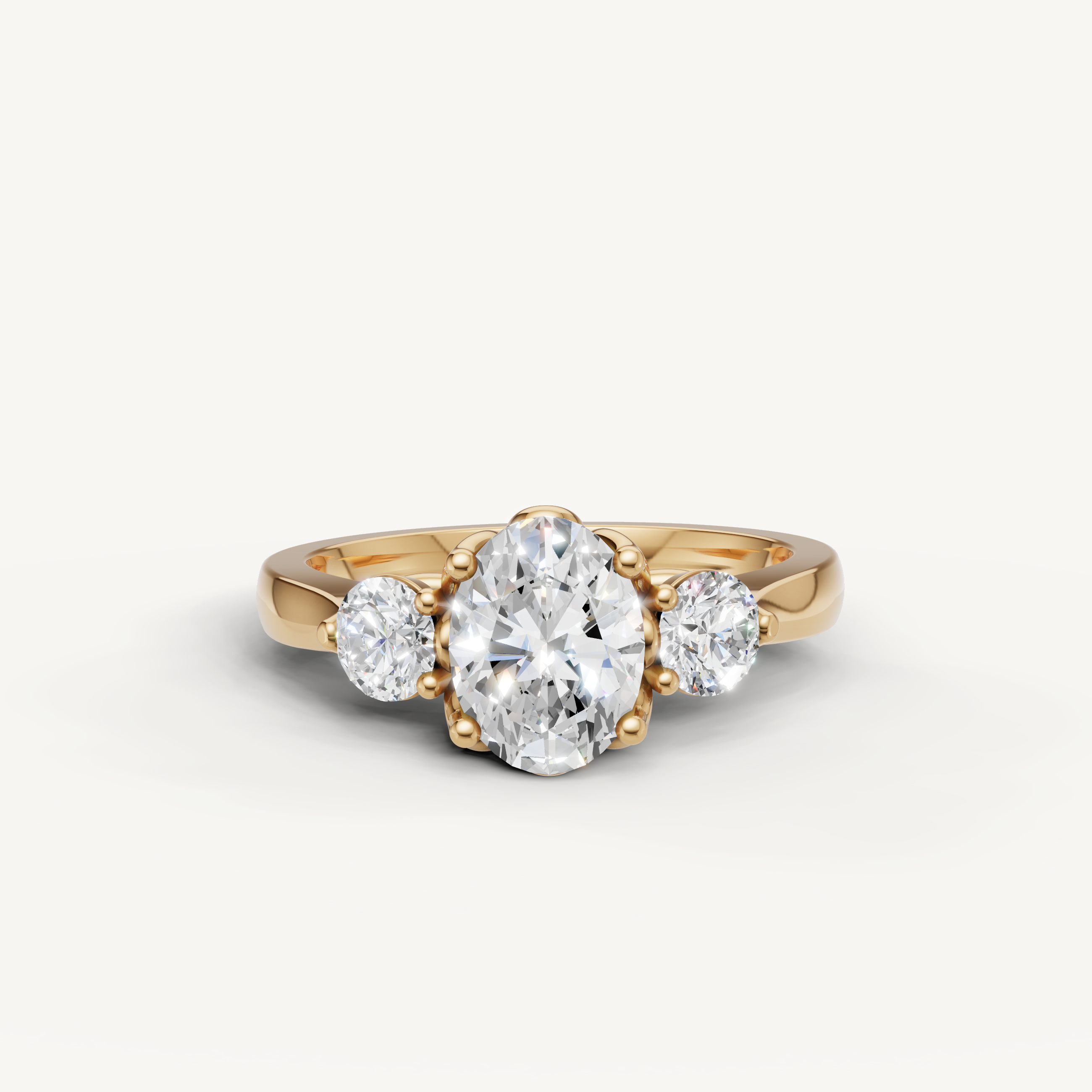 Raul Diamonds Oval Cut Three Stone Engagement Ring in Yellow Gold