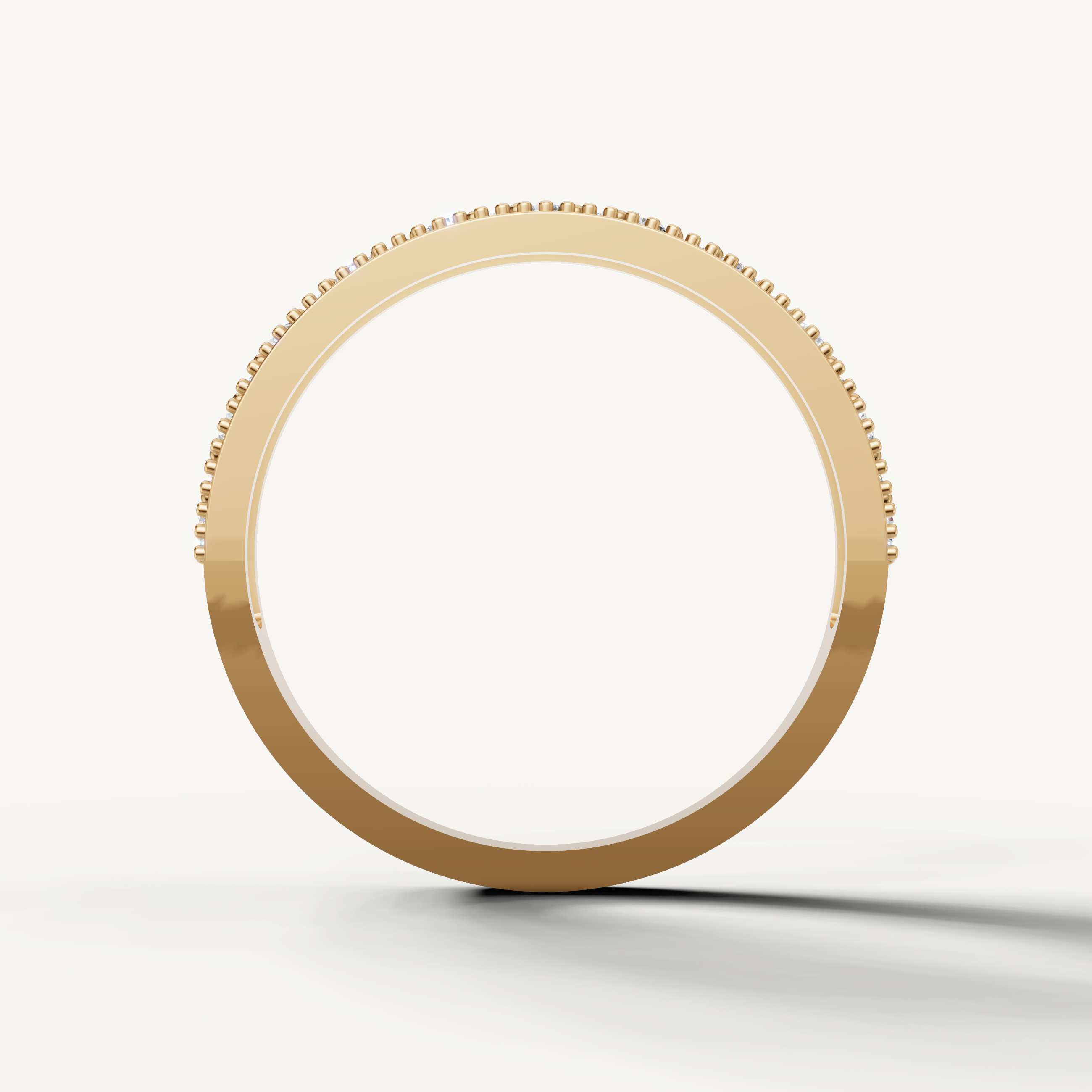 Fine yellow gold stackable diamond wedding ring with vintage inspired milgrain edges by Raul Diamonds