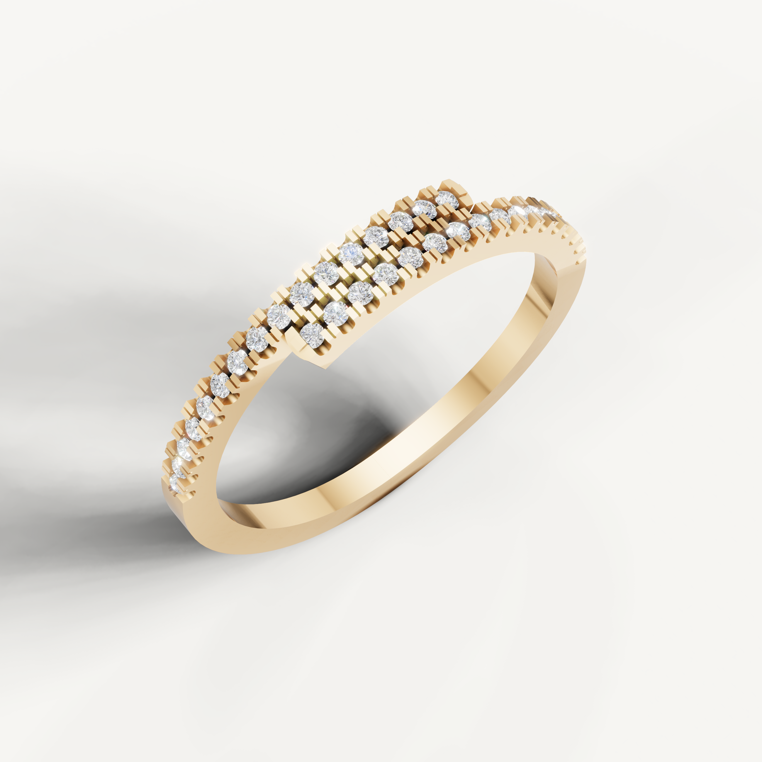 Elegant yellow gold criss cross diamond wedding band by Raul Diamonds with pavé round diamonds