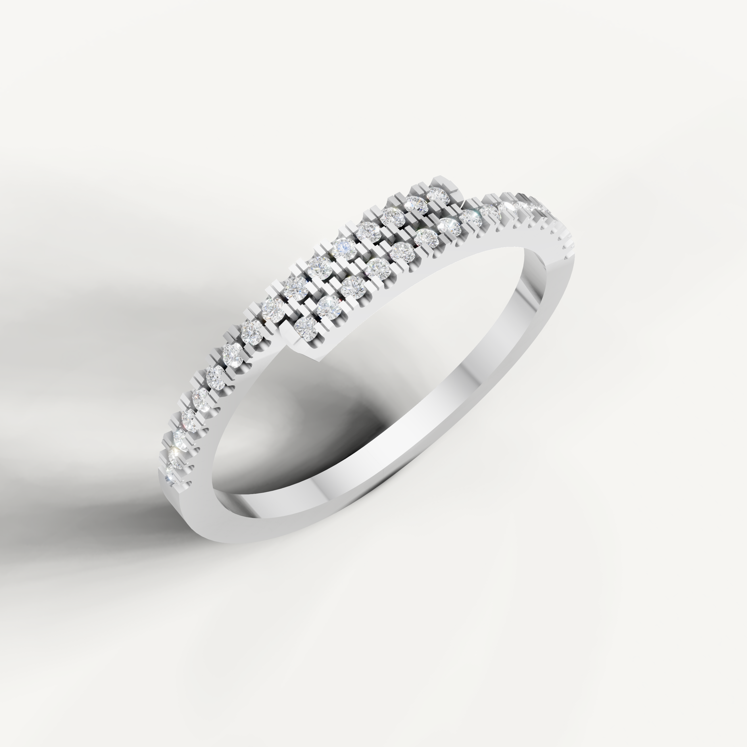 Elegant white gold contemporary wedding band featuring pavé set diamonds by Raul Diamonds