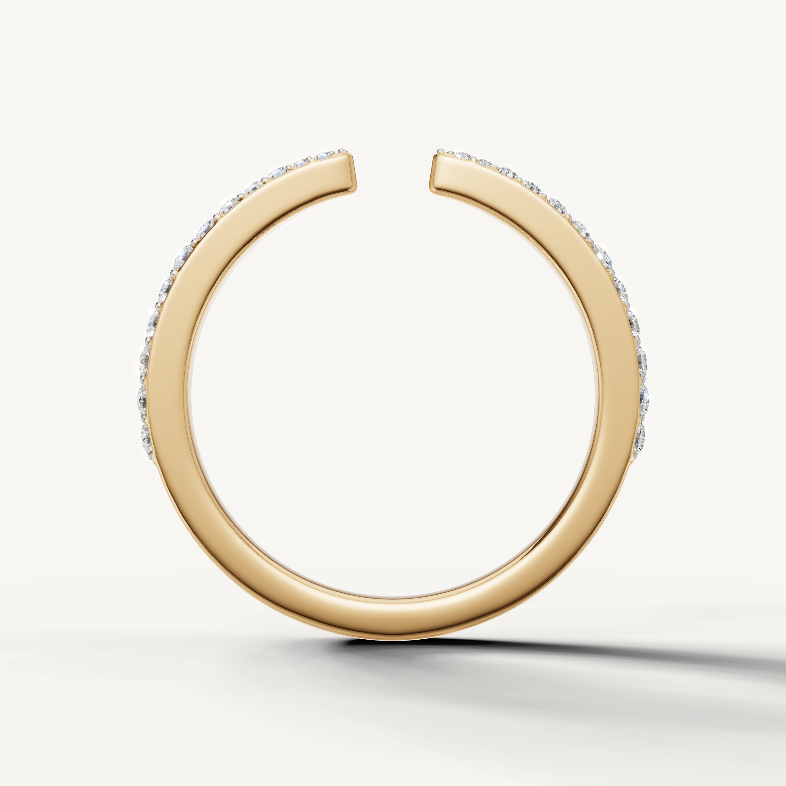 Fine yellow gold stackable open diamond wedding ring crafted by Raul Diamonds