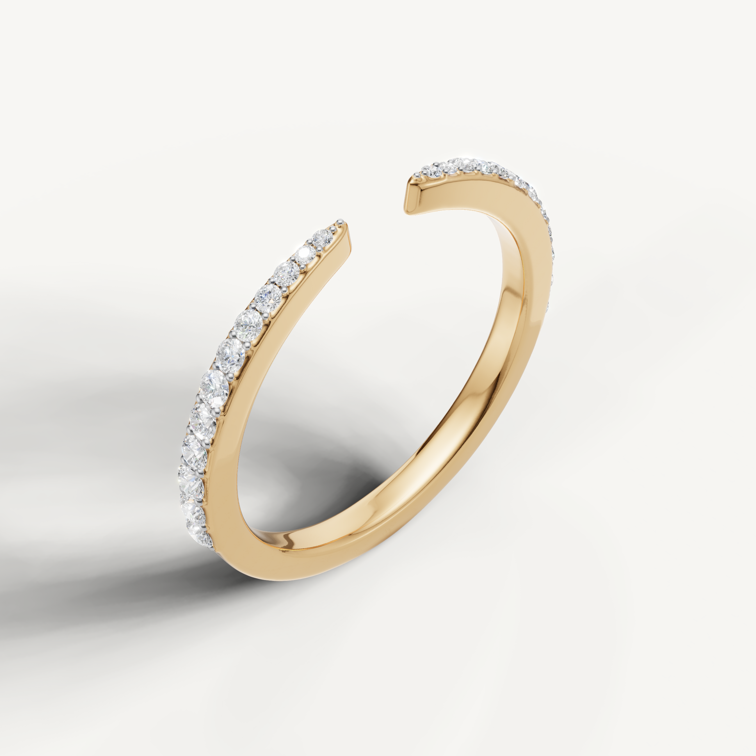 Elegant yellow gold open cuff wedding ring featuring sparkling round diamonds by Raul Diamonds