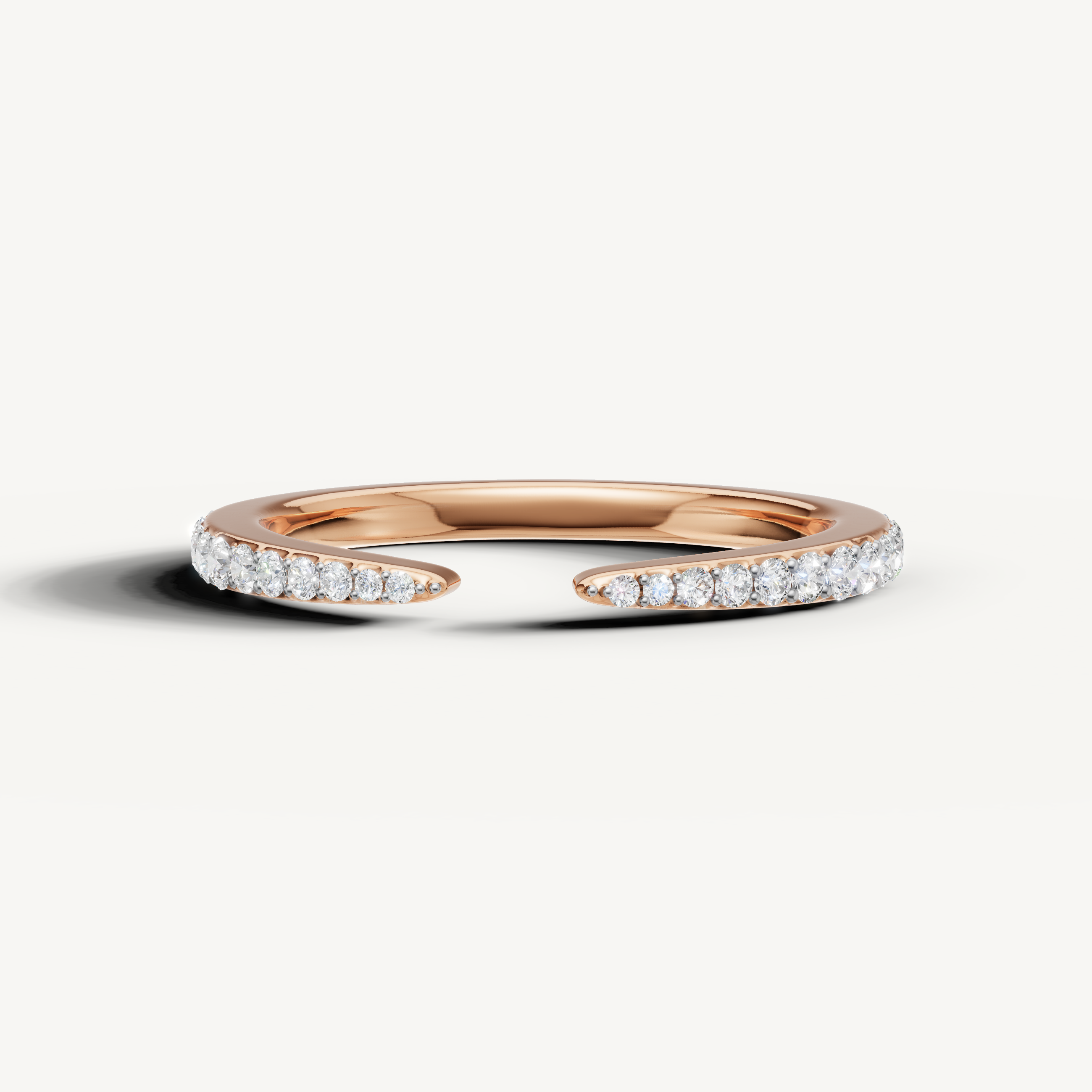 Raul Diamonds rose gold open diamond wedding band with shimmering pavé round diamonds