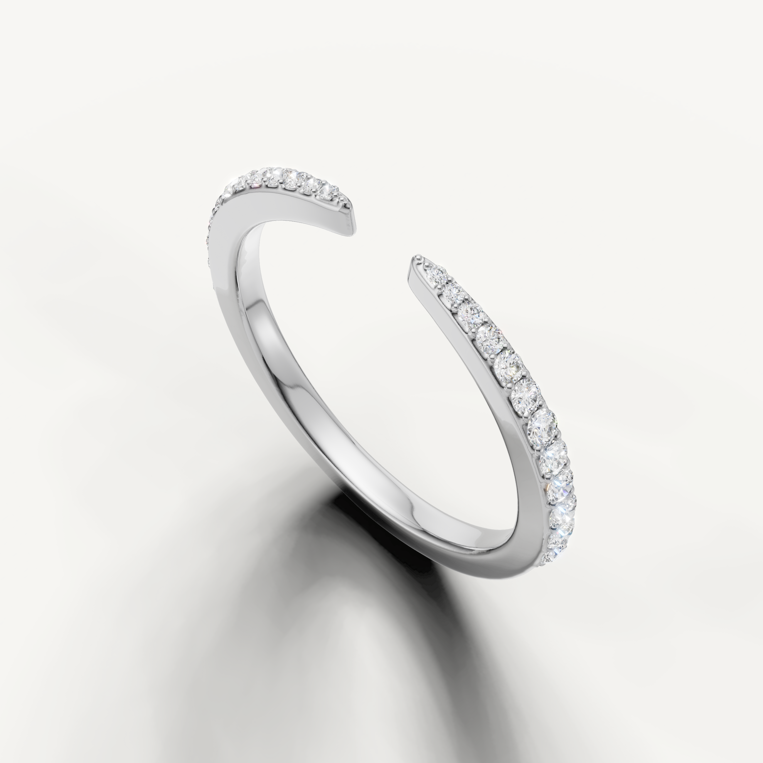 White gold modern diamond wedding band with open front and pavé diamond accents