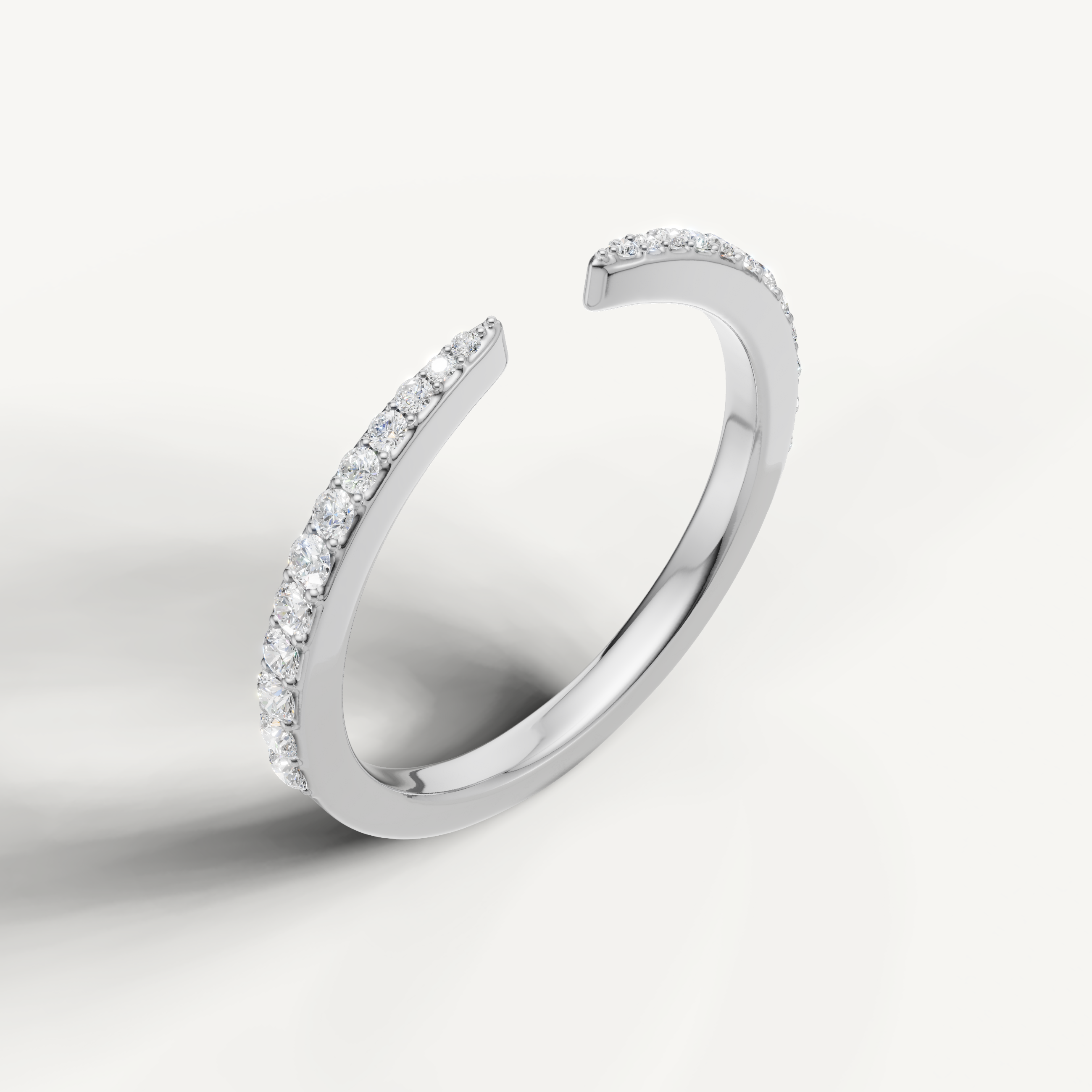 Elegant white gold open cuff wedding ring featuring sparkling diamonds by Raul Diamonds