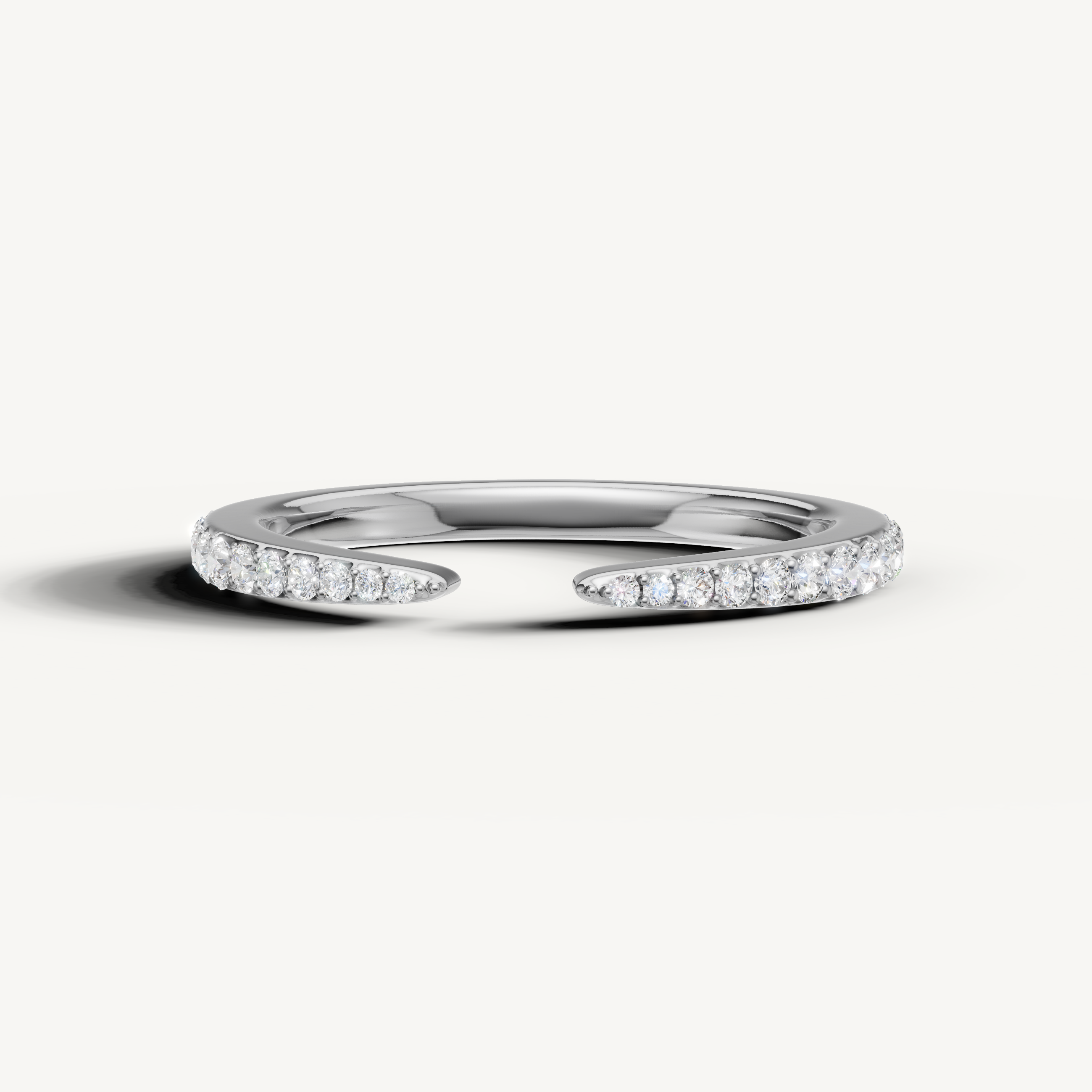 Raul Diamonds white gold open diamond wedding band with pavé round brilliant diamonds